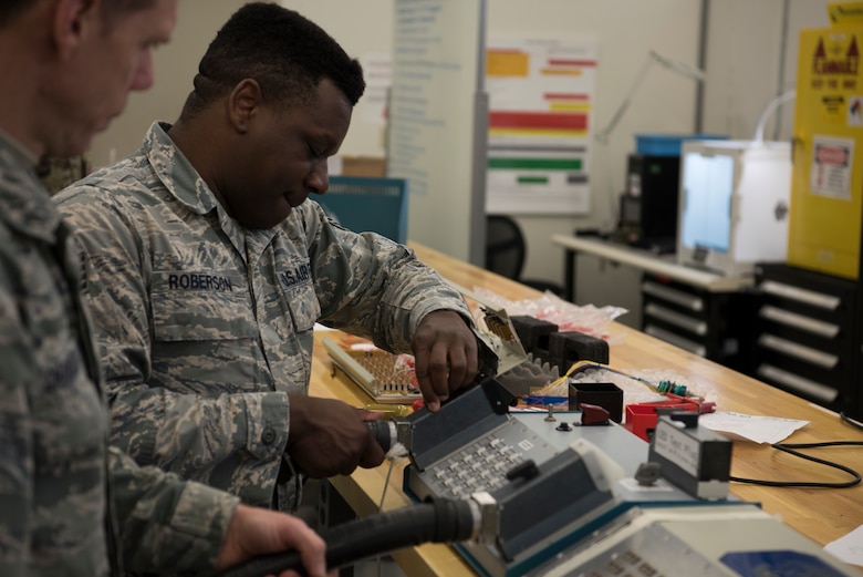 U.S. Air Force Staff Sgt. Brent Roberson, 366th Maintenance Squadron avionics backshop technician, builds an avionics Electronics Systems Test Station (ESTS) cable tester. This invention reduces a two hours task to a 30 second task, saving time, money and enhancing readiness.