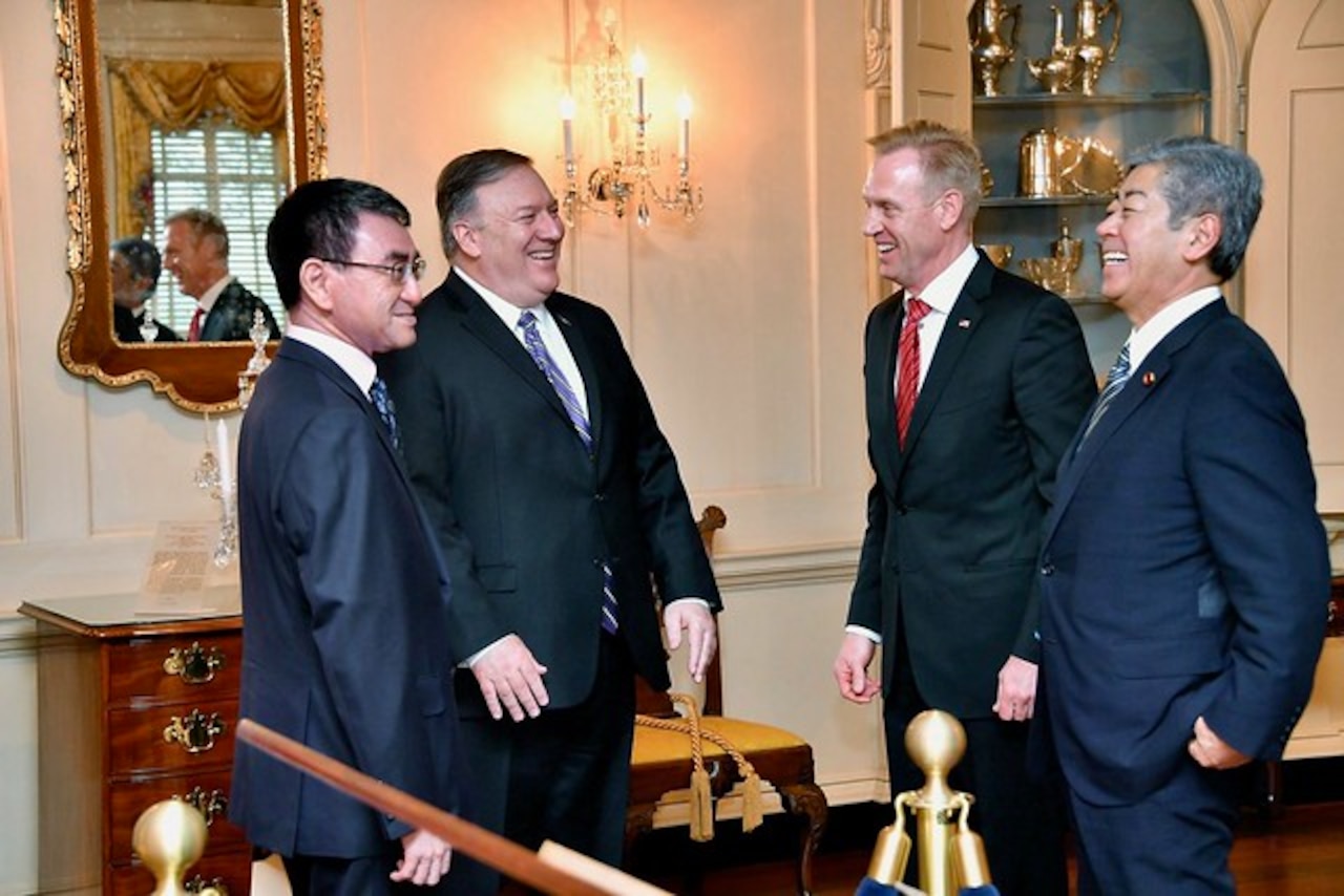 Acting Defense Secretary Patrick M. Shanahan, Secretary of State Michael R. Pompeo and two Japanese leaders stand in a half circle.