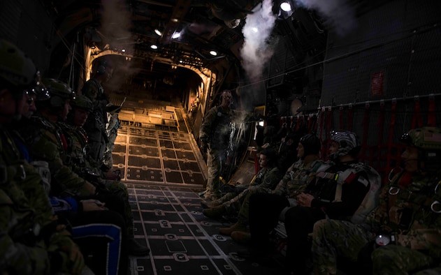 U.S. Air Force Brig. General Claude K. Tudor Jr., commander of the 24th Special Operations Wing, relinquishes command on the back of an MC-130H Combat Talon II, Hurlburt Field, Florida, April 19, 2019.