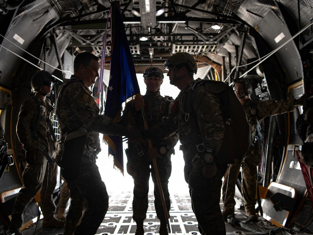 U.S. Air Force Brig. General Claude K. Tudor Jr., commander of the 24th Special Operations Wing, relinquishes command on the back of an MC-130H Combat Talon II, Hurlburt Field, Florida, April 19, 2019.