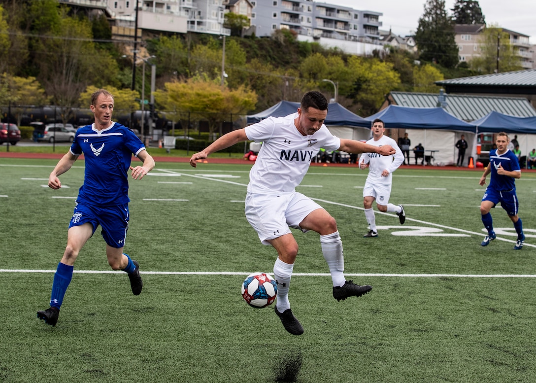 NAVAL STATION EVERETT, Wa. (April 18, 2019) - Petty Officer 3rd Class Telang Luke, stationed at United States Coast Guard Station, St. Petersburg, FL. stops a ball from going out of bounds during a match against the Air Force soccer team at the Armed Forces Sports Men’s Soccer Championship hosted at Naval Station Everett. (U.S. Navy Photo by Mass Communication Specialist 2nd Class Ian Carver/RELEASED).