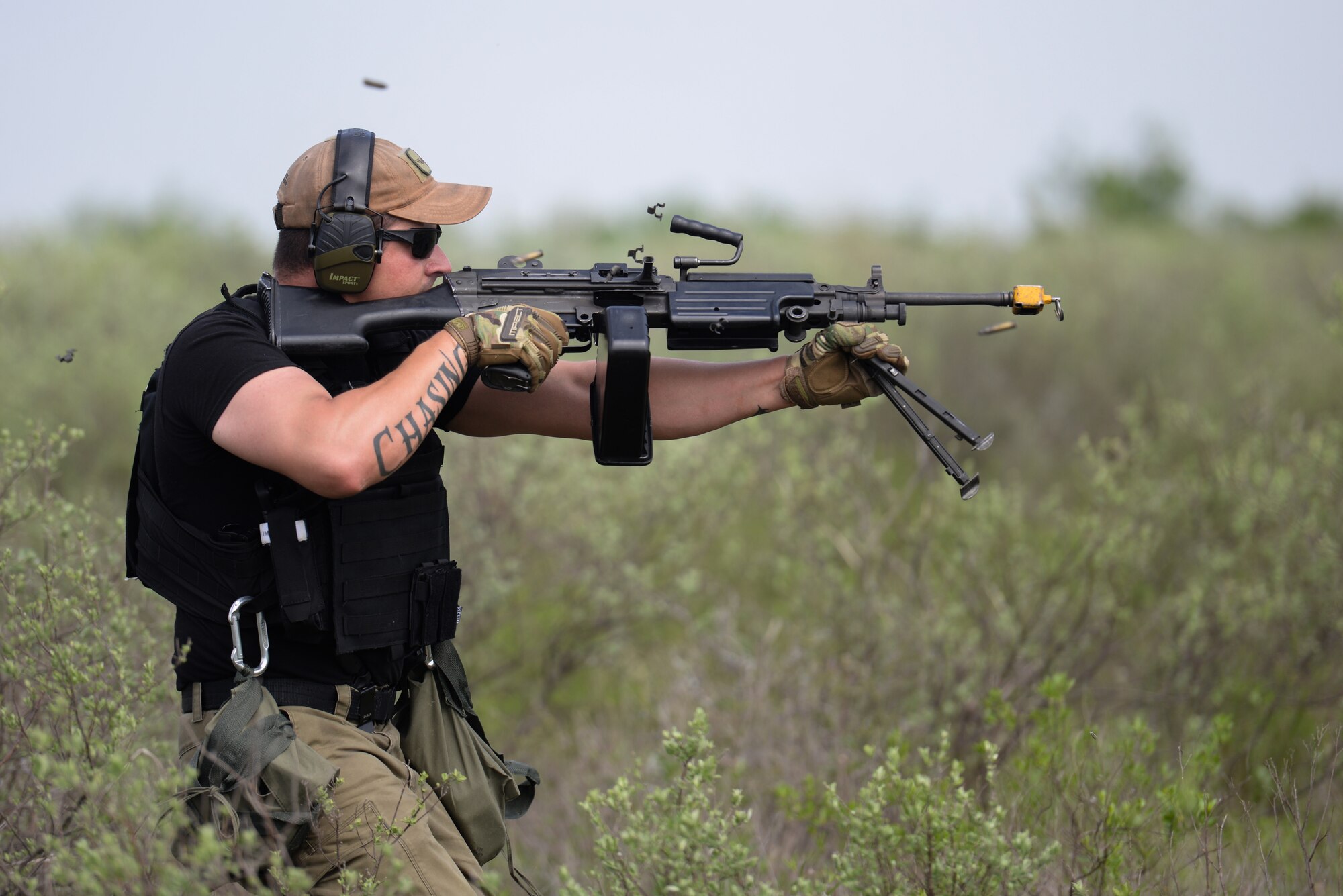 Johannes Thiel, 47th Security Forces Squadron patrolman, lays down suppressive fire as his team advances on opposing forces during an exercise at Laughlin Air Force Base, Texas, April 17, 2019. Thiel, a former U.S. Marine, brings his combat experience to Laughlin and got a chance to challenge his tactics, teamwork and physical fitness as he and his team were put head to head with a simulated opposing force, consisting of many coworkers he works with daily. (U.S. Air Force photo by Senior Airman Benjamin N. Valmoja)