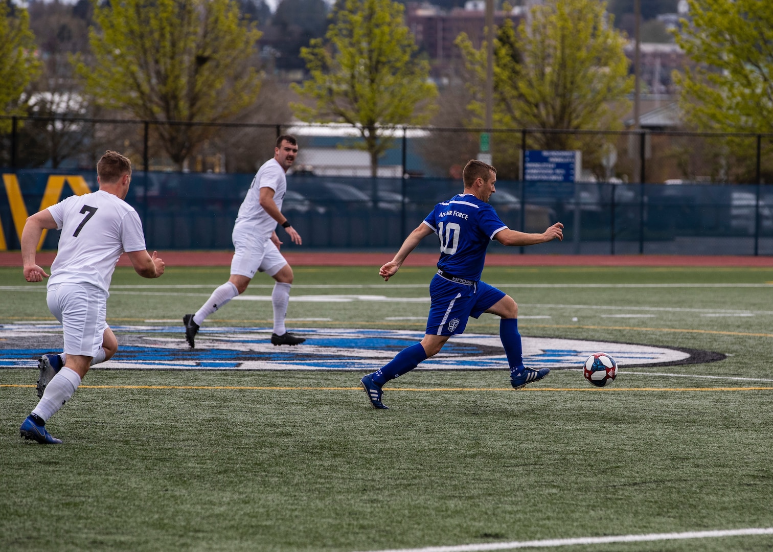 NAVAL STATION EVERETT, Wash. (April 18, 2019) -- Air Force Capt. Johnny Melcher travels the mid-field looking for a goal during the 2019 Armed Forces Men's Soccer Championship.  (U.S. Navy Photo, MC2 Ian Carver/Released)