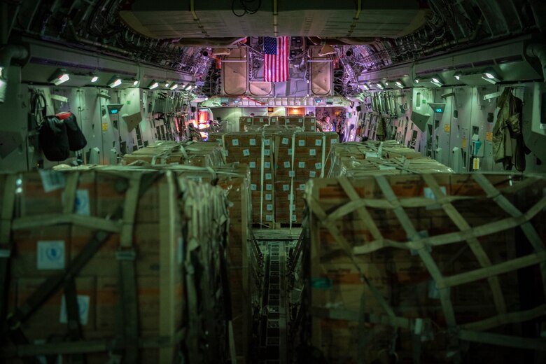 World Food Programme food and supplies are transported in a C-17 Globemaster III assigned to the 16th Airlift Squadron, Joint Base Charleston, Charleston, South Carolina, supporting Combined Joint Task Force-Horn of Africa to Beira, Mozambique, April 2, 2019. The task force is helping meet requirements identified by the United States Agency for International Development (USAID) assessment teams and humanitarian organizations working in the region by providing logistics support and manpower to USAID at the request of the Government of the Republic of Mozambique. (U.S. Air Force Photo by Tech. Sgt. Chris Hibben)