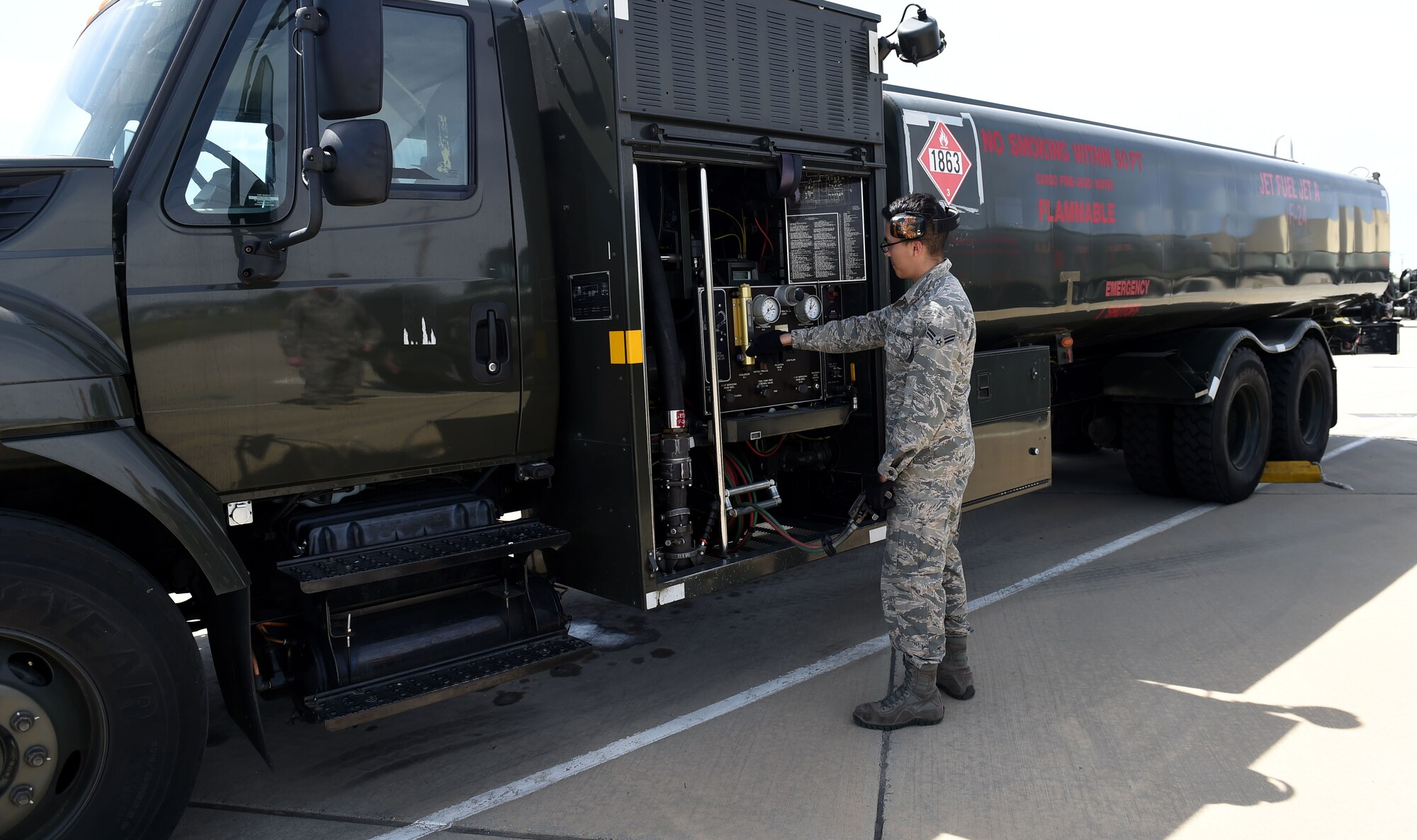 Airman 1st Class Kevin Molina, 627th Logistics Readiness Squadron fuels technician, adjusts the control panel on a fuel truck on March Air Reserve Base in California, March 1, 2019.