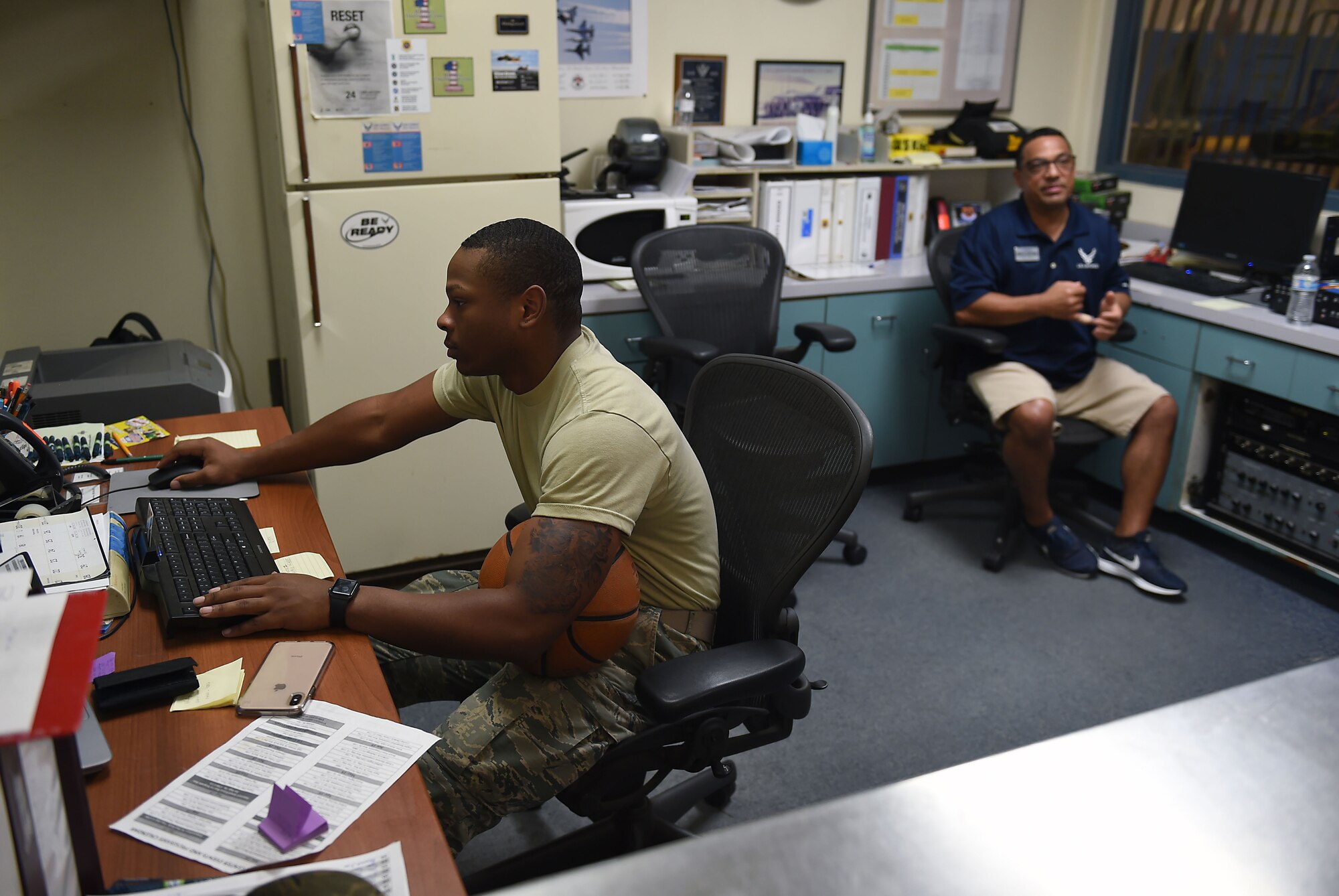 Airman 1st Class Shon Darra Smith, 627th Force Support Squadron fitness specialist, and Marco DeFelice, March Air Reserve Base fitness specialist, man the front desk at the March Air Reserve Base Fitness Center in California, March 1, 2019.