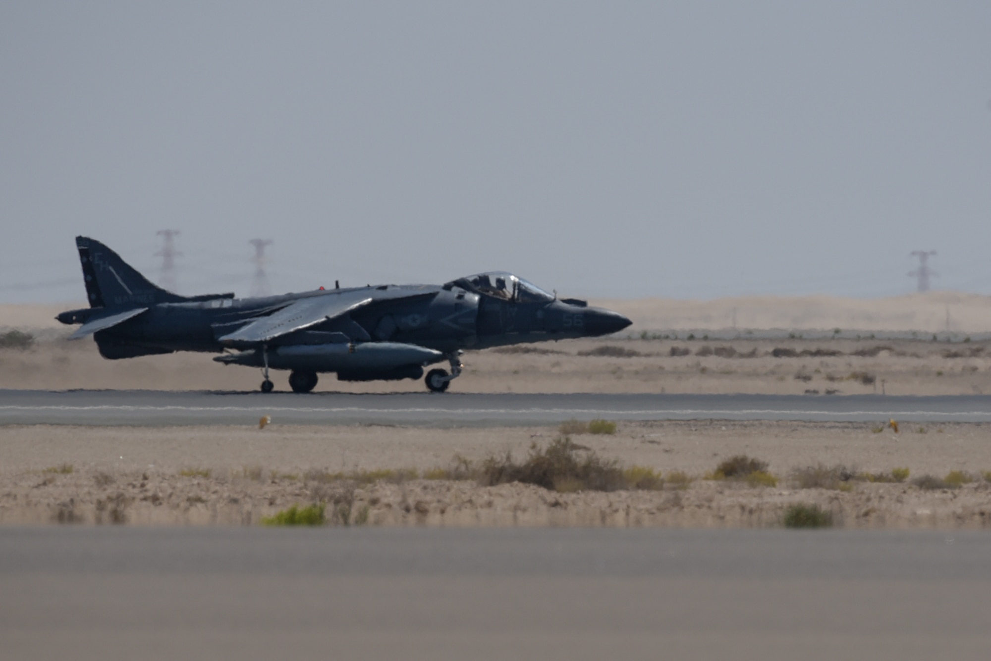 An AV-8B Harrier II, assigned to the 22nd Marine Expeditionary Unit, lands after a mission at Al Dhafra Air Base, United Arab Emirates, April 16, 2019.
