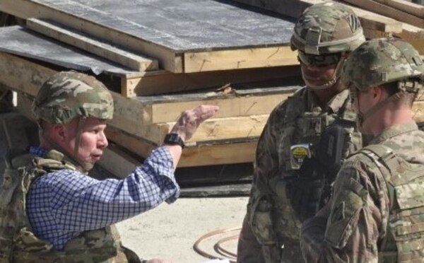 Major Rich Mahn, Military Deputy DPM for USACE Afghanistan and CPT Jamar Littlejohn, Task Force Warrior Battalion Engineer brief General Semonite on the enhancements to security capabilities during a final project visit before he got on a plane to head back to Washington.