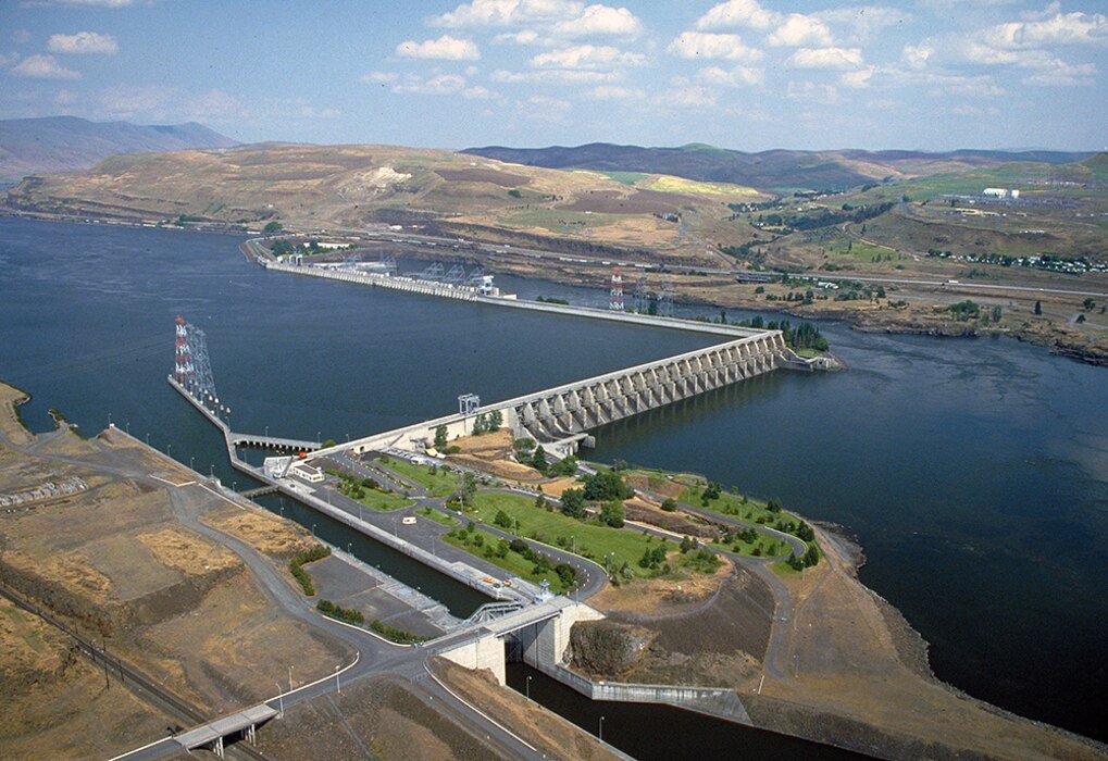 The Dalles Dam, Lake Celilo, and associated facilities are operated for Hydropower, Navigation, Fish & Wildlife, Recreation, Water Quality, and Irrigation.
The Dalles Lock and Dam was authorized by Congress for power and navigation in the 1950 Flood Control Act. The project was constructed between 1952 and 1957 near the city of The Dalles, OR, 192 miles upstream of the Pacific Ocean. Lake Celilo extends upstream of the dam for 24 miles to John Day Dam.