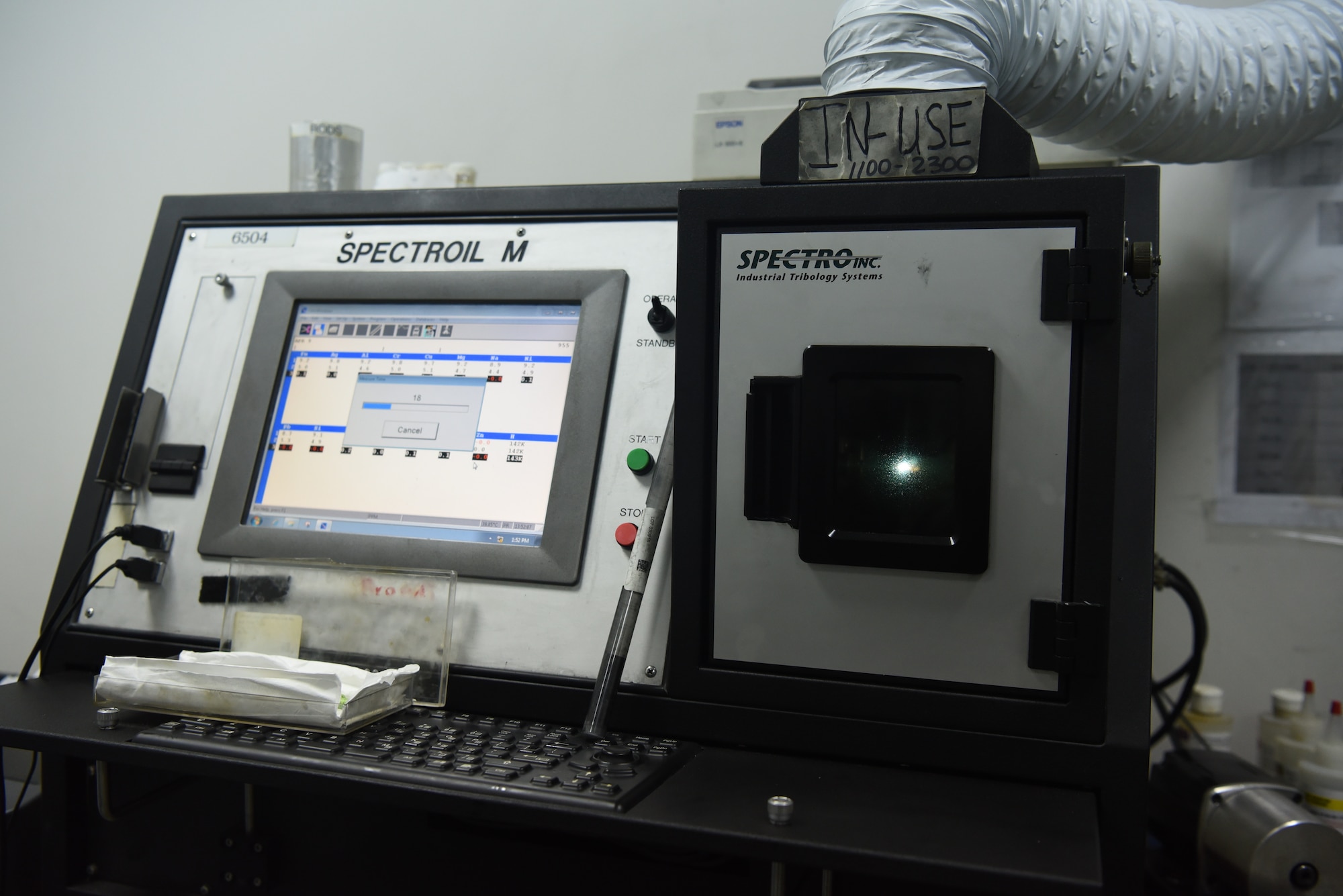 A spectrometer runs a Joint Oil Analysis Program on a controlled sample, April 12, 2019, on Al Dhafra Air Base, United Arab Emirates.