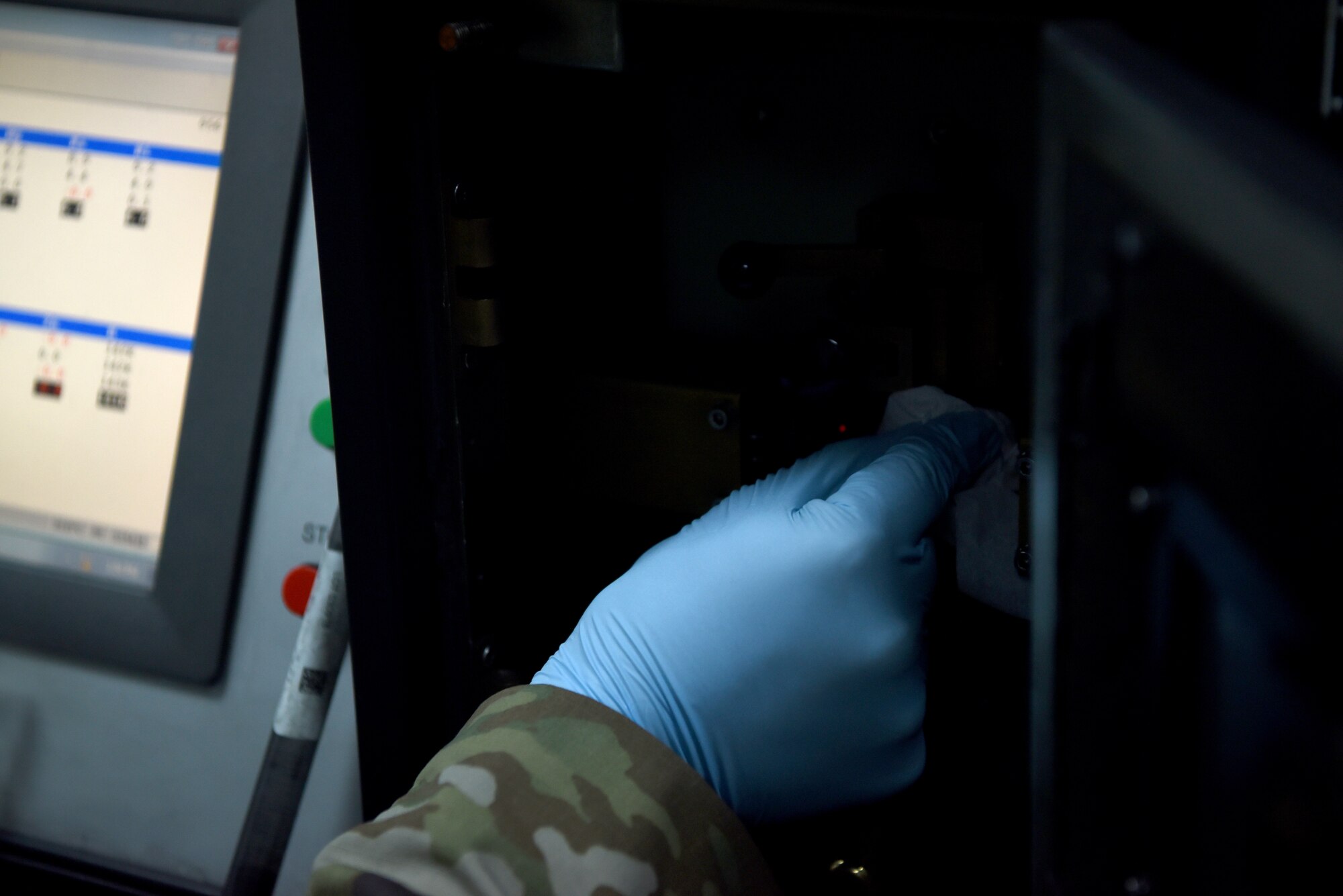 Senior Airman Jared Allen, 380th Expeditionary Maintenance Squadron Nondestructive Inspection journeyman, cleans the spectrometer after demonstrating how to run a Joint Oil Analysis Program, April 12, 2019, on Al Dhafra Air Base, United Arab Emirates.