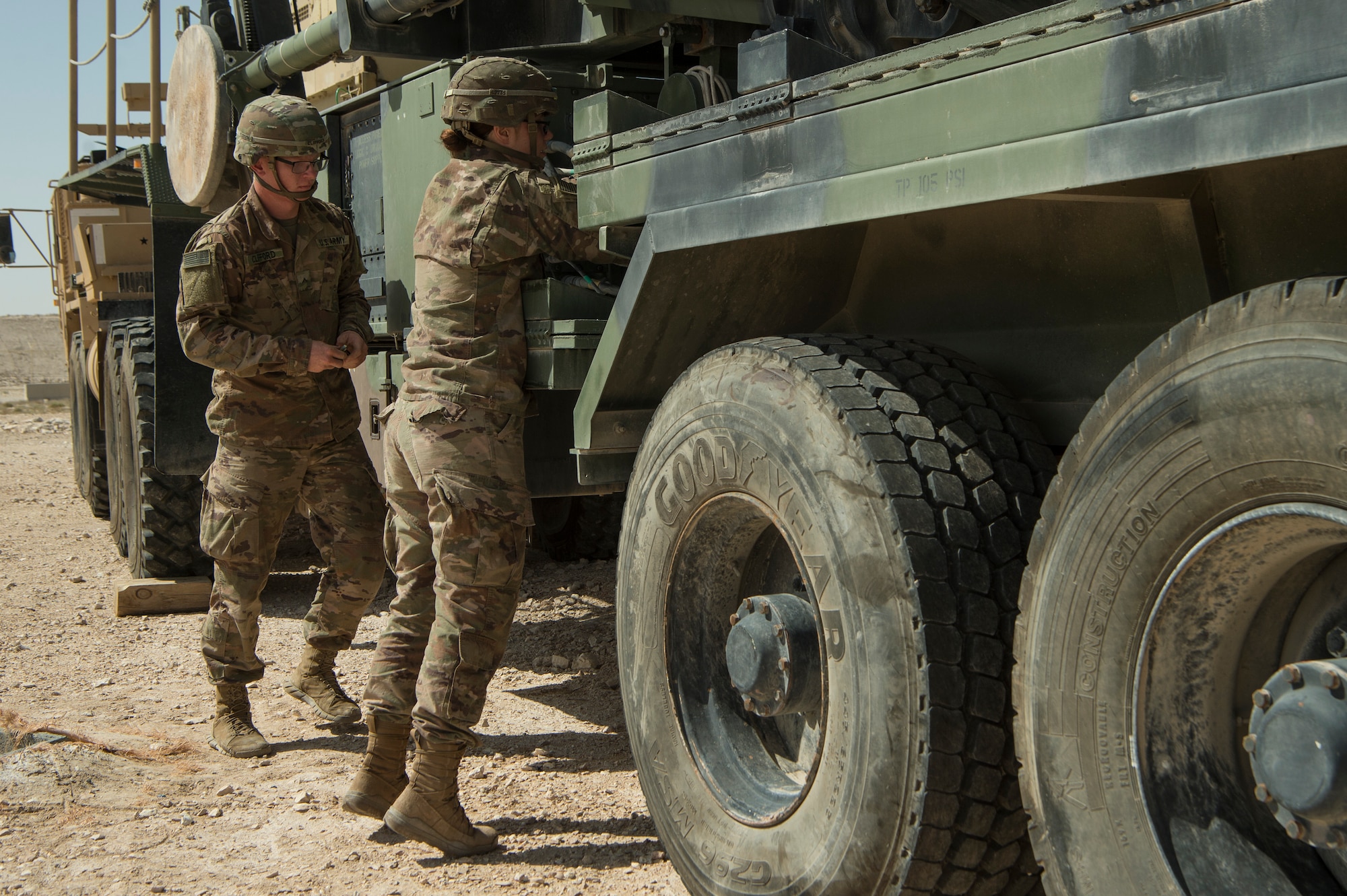 U.S. Army Pvt. Bridger Clifford, left, and U.S. Army Pfc. Abbigail Carey, right, both Charlie Company, 1st Battalion, 43rd Air Defense Artillery (ADA) Battalion, 11th ADA Brigade patriot missile maintainers and operators, perform patriot missile readiness drills at Al Udeid Air Base, Qatar, April 16, 2019. Soldiers of the 1-43rd ADA Battalion maintain and control the installation’s Patriot missile launchers in support of personnel and operations at Al Udeid. (U.S. Air Force photo by Tech. Sgt. Christopher Hubenthal)