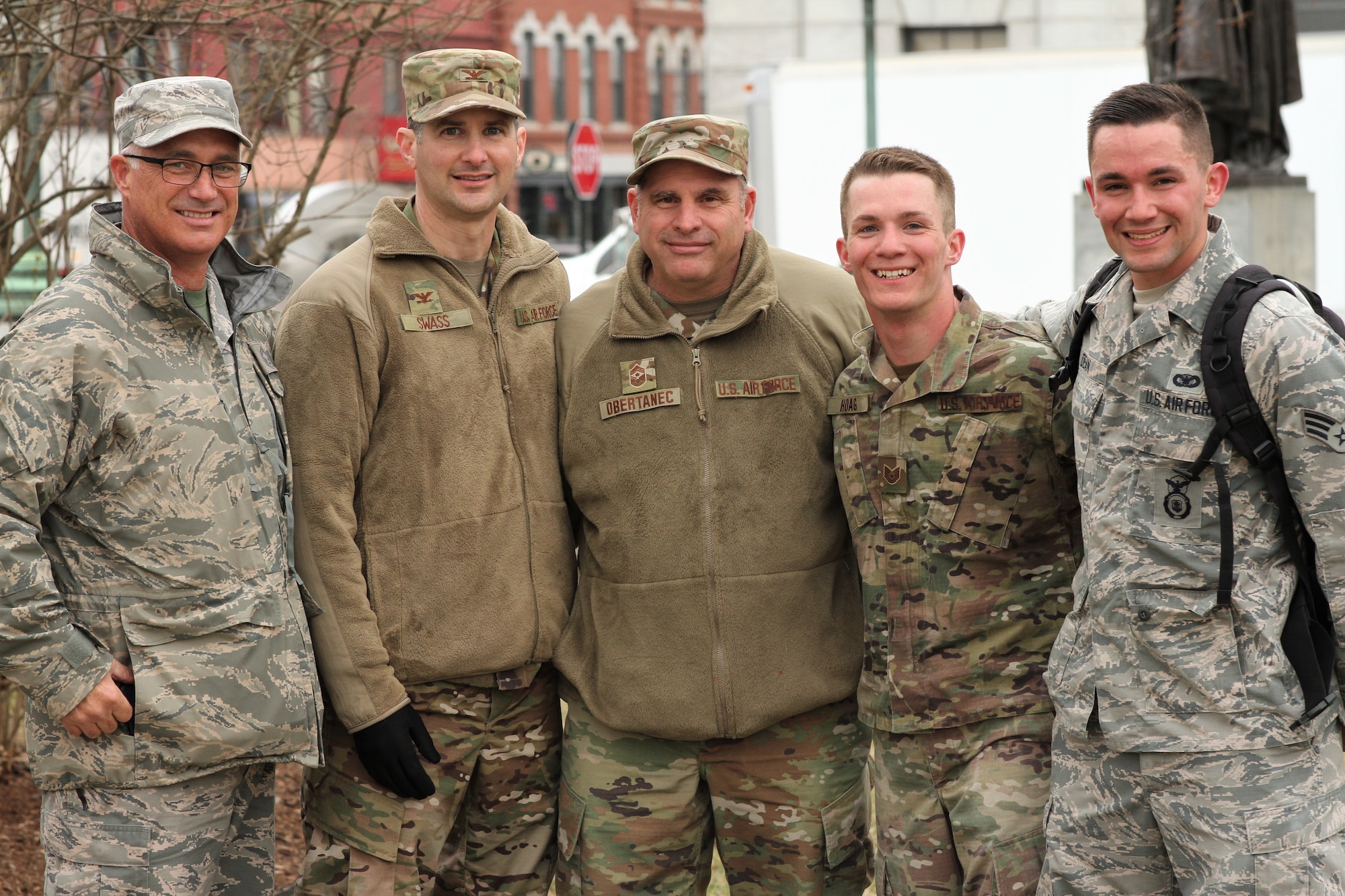 Tech Sgt. Kraig Hoag (fourth from left), a flight sergeant assigned to 157th ARW, poses with fellow airmen after completing a 12-mile ruck march that concluded the NHNG's Best Warrior Competition in Concord, N.H. on April 12. 

Hoag was one of 26 competitors during the four-day competition, which also tested land navigation and marksmanship skills, and involved N.H. Army Guardsmen, a Coast Guardsman, and Salvadoran and Canadian armed forces. Also pictured, Chief Master Sgt. Robert Wheaton, Col. Todd Swass, Chief Master Sgt. David Obertanec, and Senior Airman Devon Dean, who was Hoag's coach and sponsor for the event.