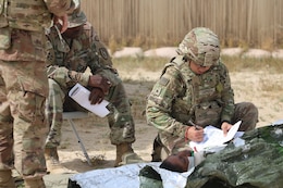 Sgt. Hilda Cepeda, 184th Sustainment Command, fills out a medical card during a Combat Life Saver course held by the 300th Sustainment Brigade at Camp Arifjan, Kuwait, April 19, 2019.