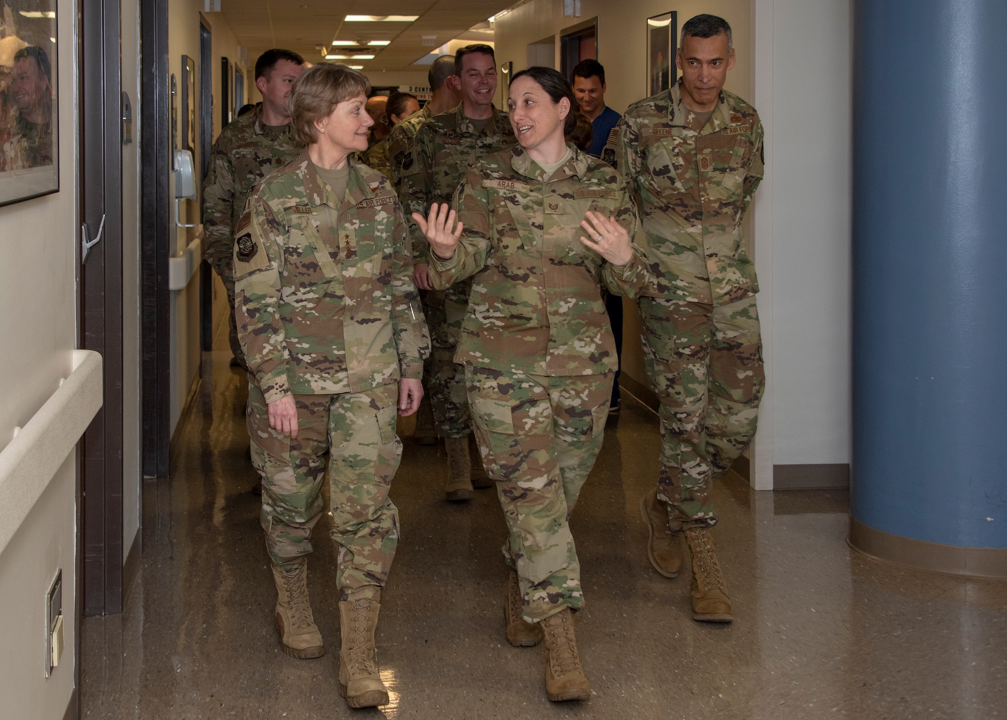 U.S. Air Force Gen. Maryanne Miller, left, Air Mobility Command commander, and Chief Master Sgt. Terrence Greene, right, AMC command chief, listen to a presentation given by Tech. Sgt. Shawna Arab, center, 60th Medical Group during a visit to David Grant USAF Medical Center, Travis Air Force Base, California, April 16, 2019. During the four-day base tour Miller and Greene met with Airmen across Travis to see firsthand how the base enhances AMC’s global mobility capabilities. (U.S. Air Force photo by Heide Couch)
