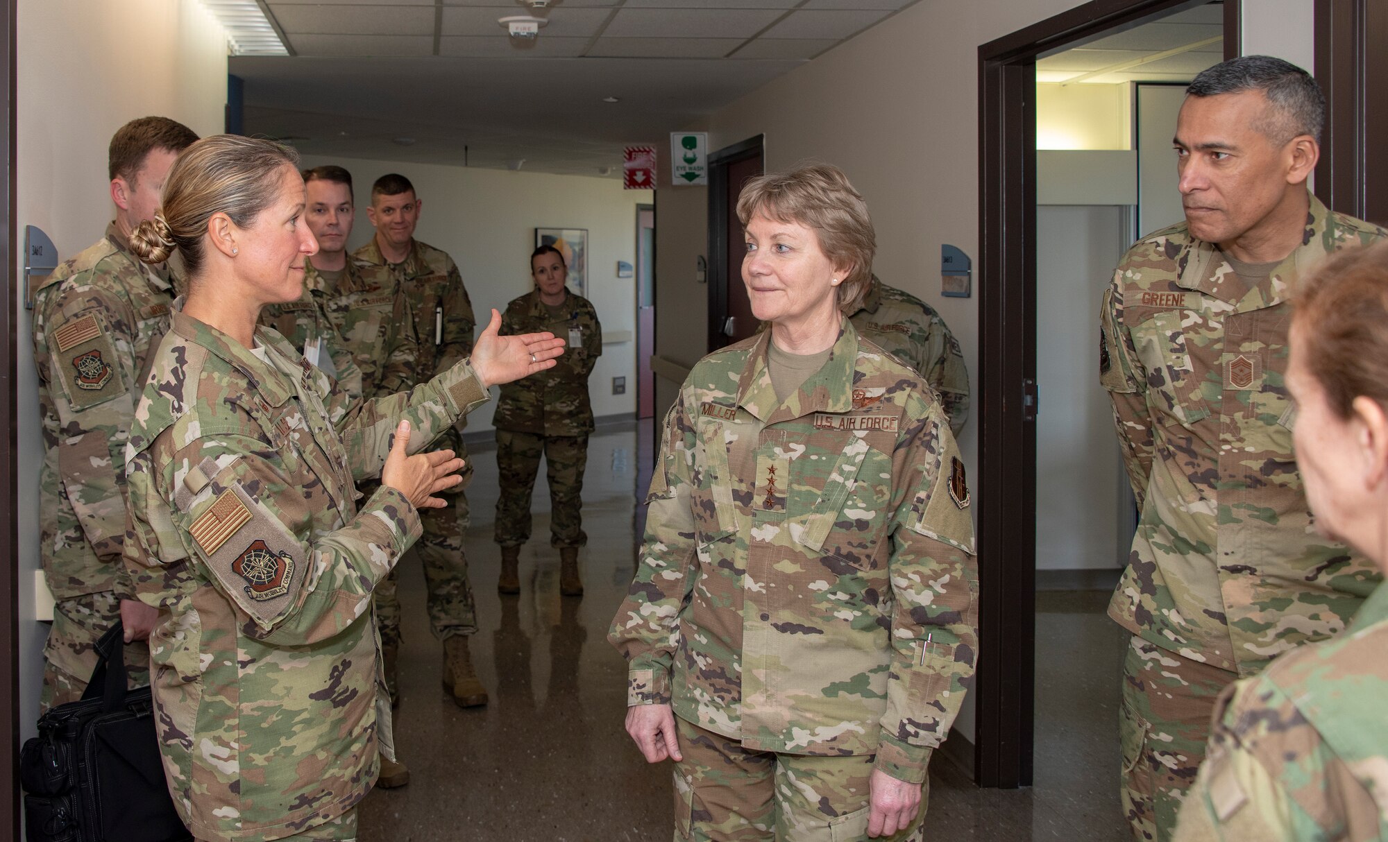 U.S. Air Force Gen. Maryanne Miller, center, Air Mobility Command commander, and Chief Master Sgt. Terrence Greene, right, AMC command chief, listen to a presentation given by Col. Kristen Beals, left, 60th Medical Group commander, during a visit to David Grant USAF Medical Center, Travis Air Force Base, California, April 16, 2019. During the four-day base tour Miller and Greene met with Airmen across Travis to see firsthand how the base enhances AMC’s global mobility capabilities. (U.S. Air Force photo by Heide Couch)
