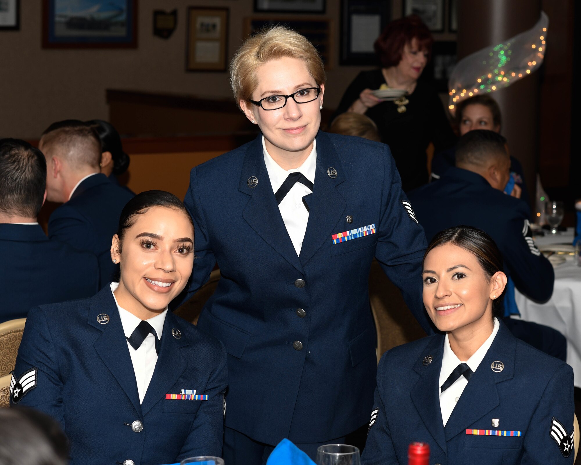 Airman of the Year recipient Senior Airman Marina Samuels (left), a health services manager, Staff Sgt. Alexandra Ackerman, an aerospace medicine services technician and Senior Airman Briseida Restrepo, a health services manager, all from the 910th Medical Squadron, pose for a photo during the 910th Airlift Wing’s annual awards banquet in the Community Activity Center here, April 6, 2019.