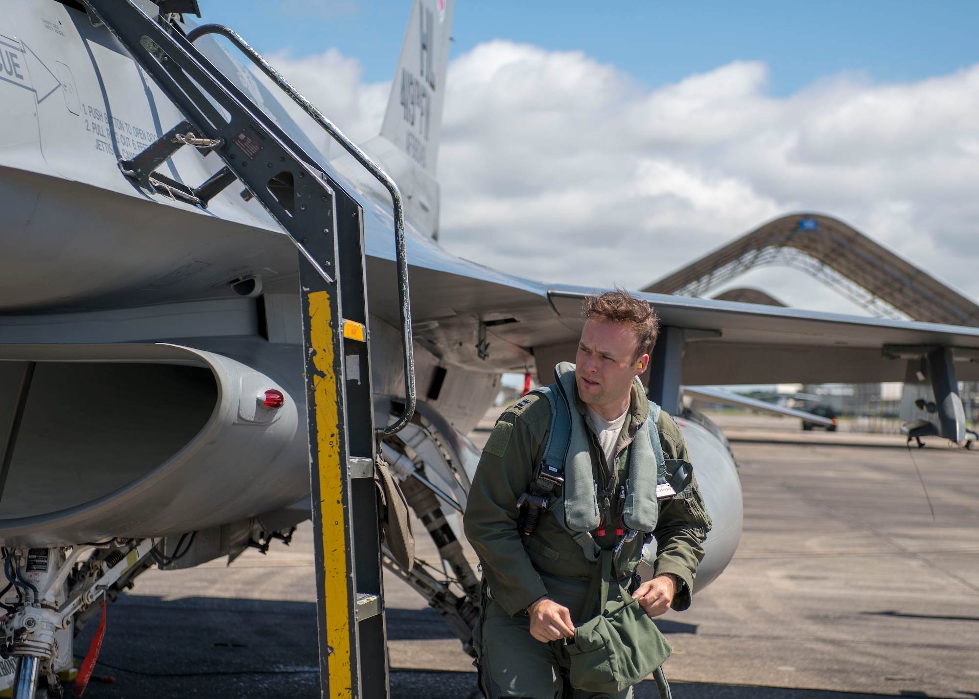U.S. Air Force Capt. Robert Ritchie, 8th Fighter Squadron F-16 Basic-Course student pilot, begins an inspection after a flight, April 9, 2019, on Naval Air Station Joint Reserve Base New Orleans, La. During the temporary duty assignment, the B-Course students completed their syllabus training. (U.S. Air Force photo by Airman 1st Class Kindra Stewart)
