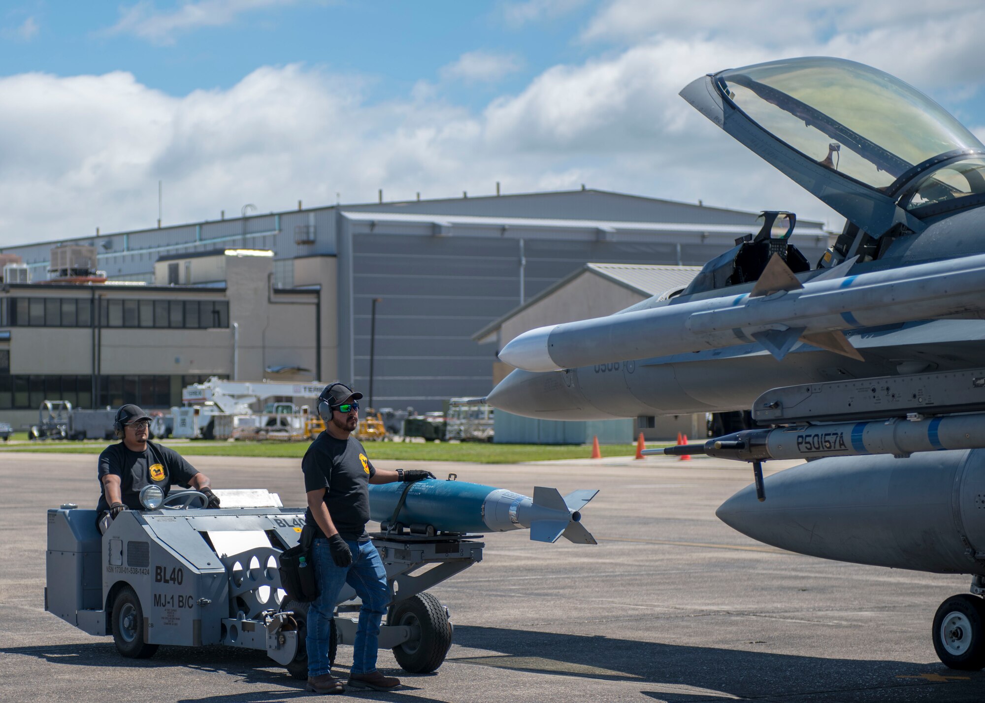 8th Fighter Squadron maintainers prepare to load a bomb on an F-16 Fighting Falcon, April 9, 2019, on Naval Air Station Joint Reserve Base New Orleans, La. Of the 158 personnel that came on the temporary duty assignment, 106 were F-16 maintainers. (U.S. Air Force photo by Airman 1st Class Kindra Stewart)