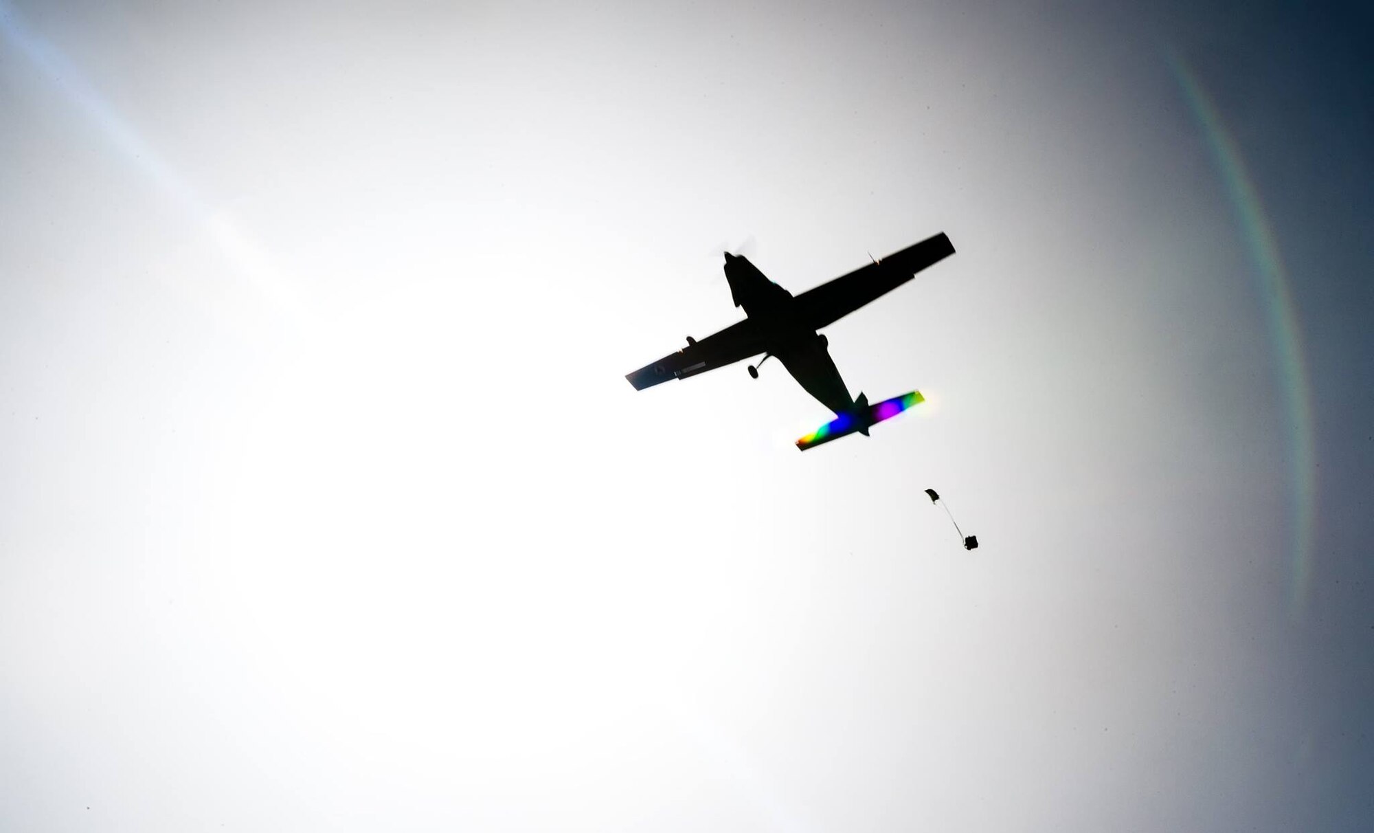 Advisors from Train, Advise, Assist Command-Air, as part of Resolute Support Mission, work in tandem with their Afghan counterparts to provide an airdrop near Kabul, Afghanistan, March 19, 2017. The TAAC-Air advisors foster working relationships and fortify confidence in the mission. (U.S. Air Force photo by Senior Airman Jordan Castelan)