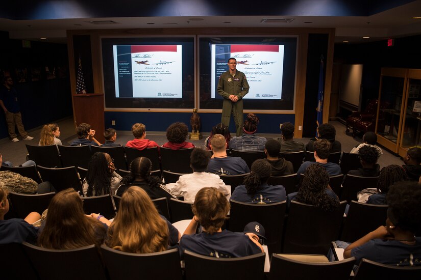 Lt. Col. Jon Baize, 15th Airlift Squadron commander, gives a briefing about his squadron and his duties as a commander to Take Flight Aviation Camp participants April 18, 2019, at Joint Base Charleston, S.C.