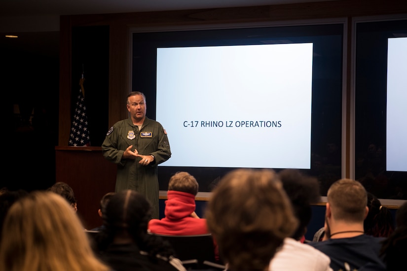 Retired U.S. Air Force Col. Rick Williamson, former 17th Airlift Squadron and 305th Air Mobility Wing commander, tells stories of his career to Take Flight Aviation Camp participants April 18, 2019, at Joint Base Charleston, S.C.