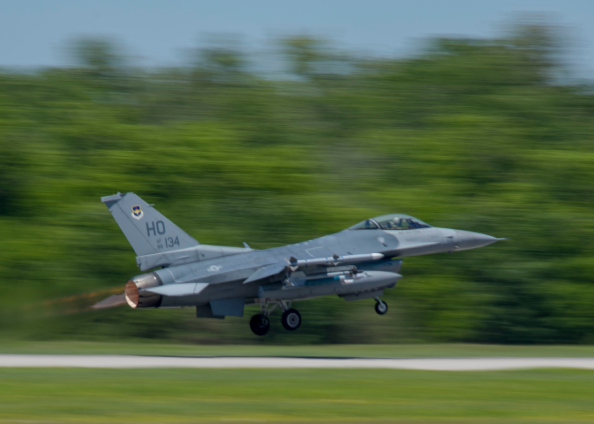 An F-16 Fighting Falcon from Holloman's 8th Fighter Squadron, takes off down the runway, April 10, 2019, on Naval Air Station Joint Reserve Base New Orleans, La. Lt. Col. Mark Sletten, 8th FS commander, said the unit set up simulated combat scenarios so the student pilots could practice working as a team with another unit. (U.S. Air Force photo by Airman 1st Class Kindra Stewart)