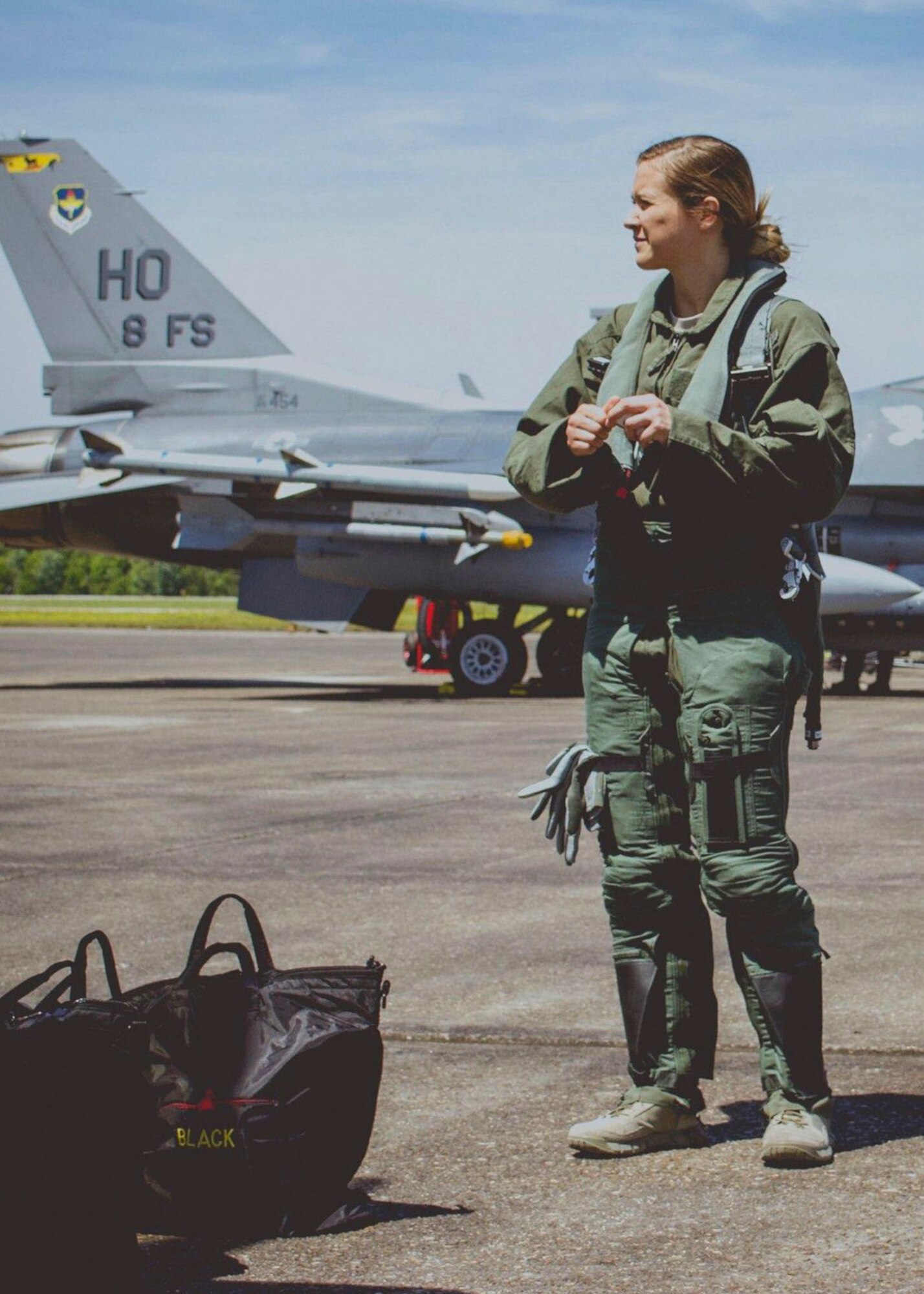 U.S. Air Force Airman Samantha Anderson, 54th Operations Support Squadron Aircrew Flight Equipment apprentice, prepares for a familiarization flight in an F-16 Fighting Falcon during a temporary duty assignment with the 8th Fighter Squadron, March 29, 2019 to April 12, 2019, at Naval Air Station Joint Reserve Base New Orleans, La. Anderson said the FAM flight was invaluable to her AFE career, because she now knows exactly how fliers need to be fitted. (Courtesy photo)