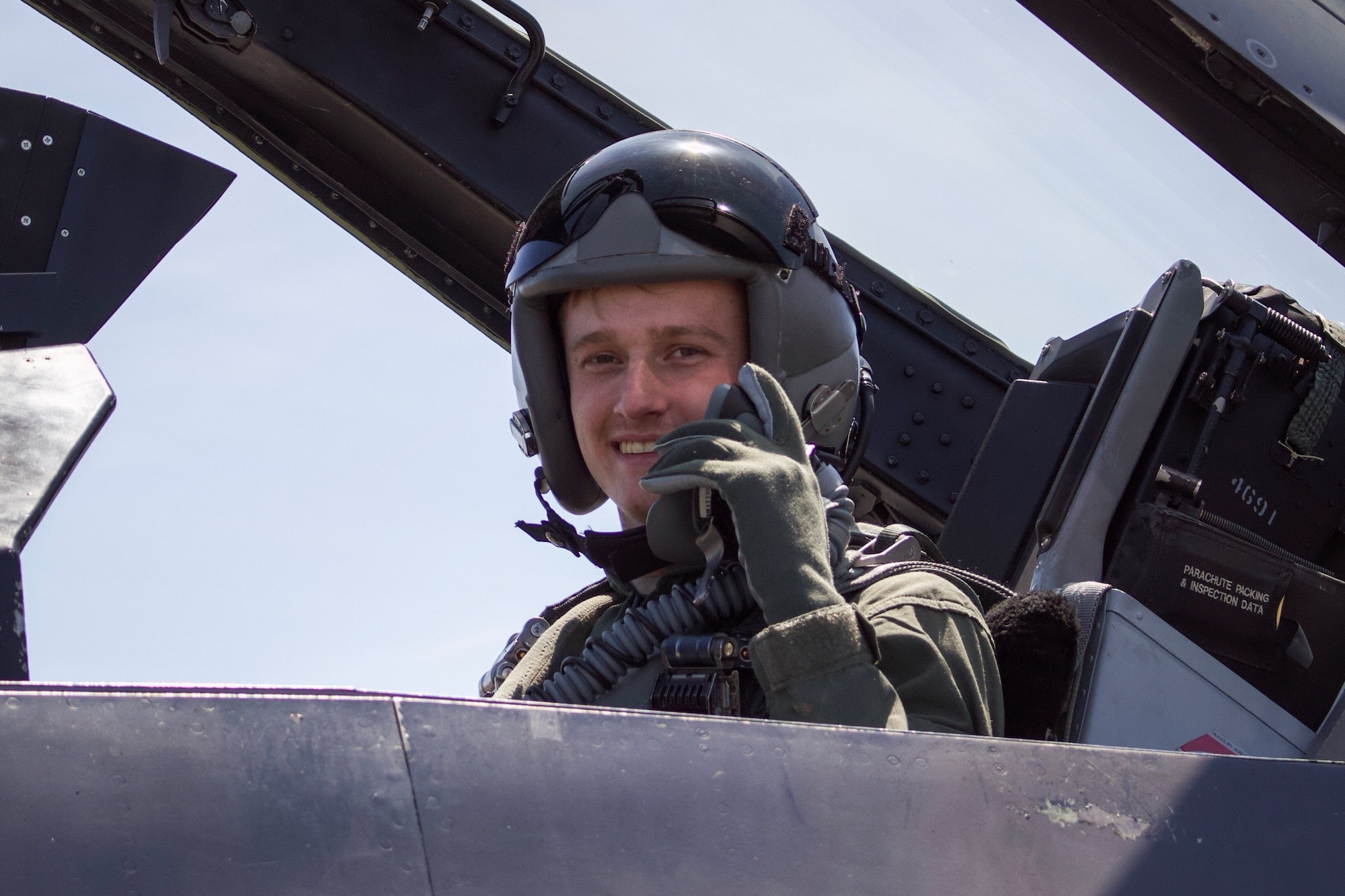 U.S. Air Force Airman 1st Class Dylan Discher, 54th Operations Support Squadron Aircrew Flight Equipment apprentice, poses for a photo before a familiarization flight in an F-16 Fighting Falcon during a temporary duty assignment with the 8th Fighter Squadron, March 29, 2019 to April 12, 2019, at Naval Air Station Joint Reserve Base New Orleans, La. Discher said having regular interactions with the pilots and hearing their stories is his favorite part about working in AFE. (Courtesy photo)