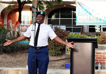 Pvt. De Andre Sisk presented his winning poem from the Joint Base San Antonio Poetry Slam April 11 at San Antonio College.