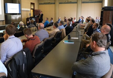 James Harrison, director of Naval Sea Systems Command (NAVSEA) Combatant Ships Division (05D2), speaks to employees at Naval Surface Warfare Center, Carderock Division, in West Bethesda, Md., on April 15, 2019, about submarine origins in his presentation “Sink or Swim: The Decade that Forged the Modern U.S. Submarine.” (U.S. Navy photo by Kelley Stirling/Released)