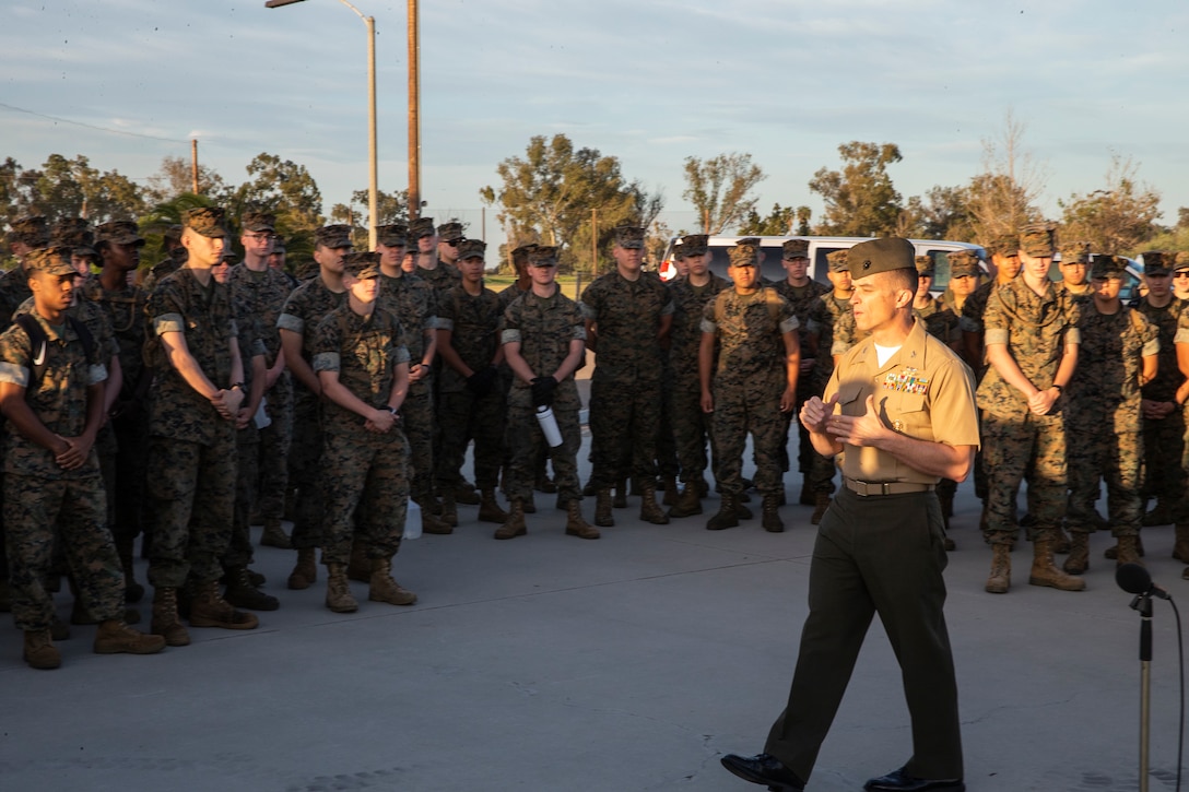 Col. Charles Dockery, commanding officer of Marine Corps Air Station Miramar, speaks to marines of Headquarters and Headquarters Squadron before commencing the base-wide clean up at MCAS Miramar, Calif., April 11. Base-wide cleanups are conducted on and off the installation to promote the installations high standards and a cleaner environment. (Photo by Cpl. Preston Hightower)