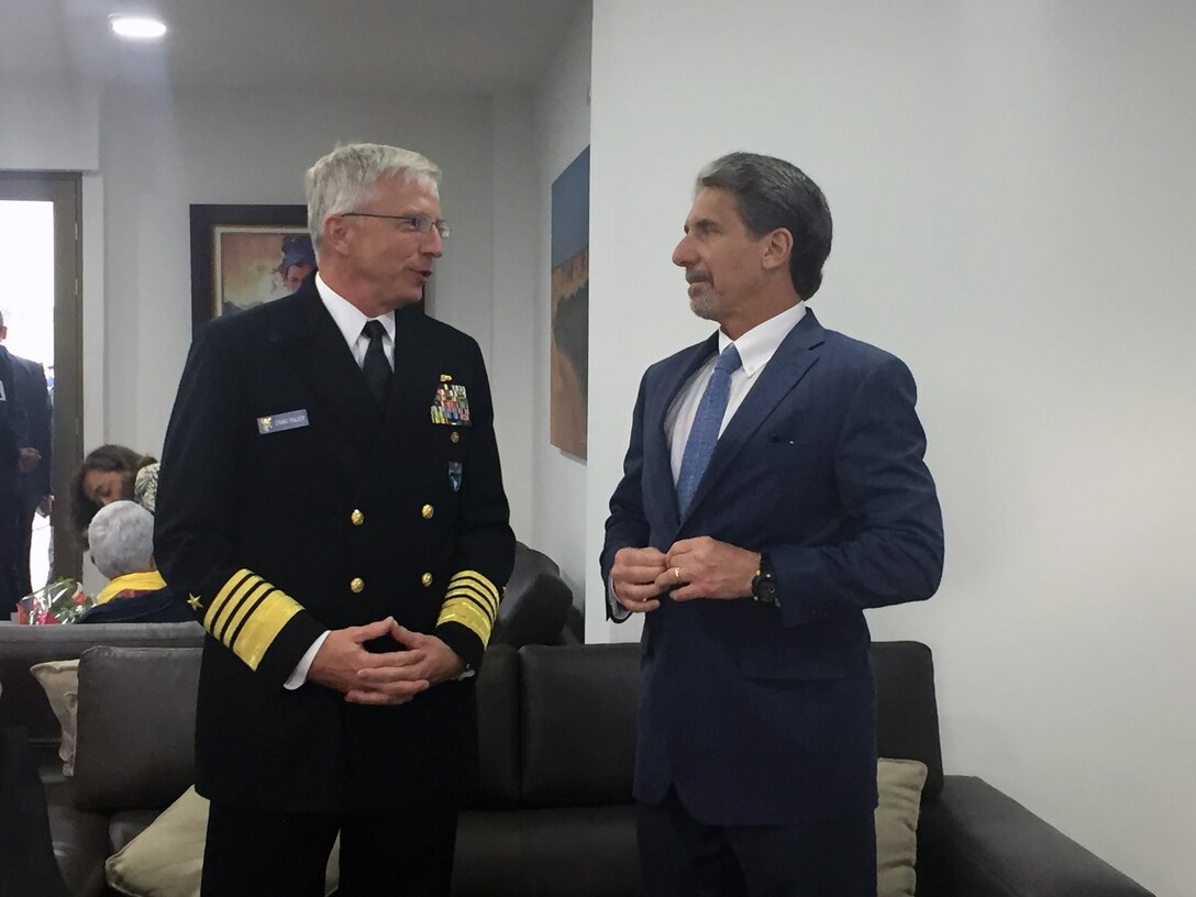 Navy Adm. Craig Faller, commander of U.S. Southern Command, talks with U.S Ambassador to Colombia Kevin Whitaker.
