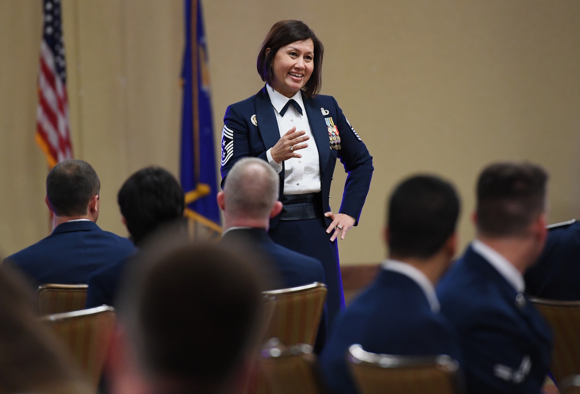 U.S. Air Force Chief Master Sgt. JoAnne Bass, 2nd Air Force command chief, delivers remarks during the Airmen In Training Ball at the Bay Breeze Event Center on Keesler Air Force Base, Mississippi, April 19, 2019. The event, hosted by the 81st Training Group, is the first of its kind and was geared toward training Airmen on how to participate and act during a formal military ball so they can feel confident in their abilities when arriving at their follow-on locations. The Airmen served in key positions throughout the ball such as emcees, color guard, POW/MIA table ceremony, national anthem singer and the invocation. (U.S. Air Force photo by Kemberly Groue)