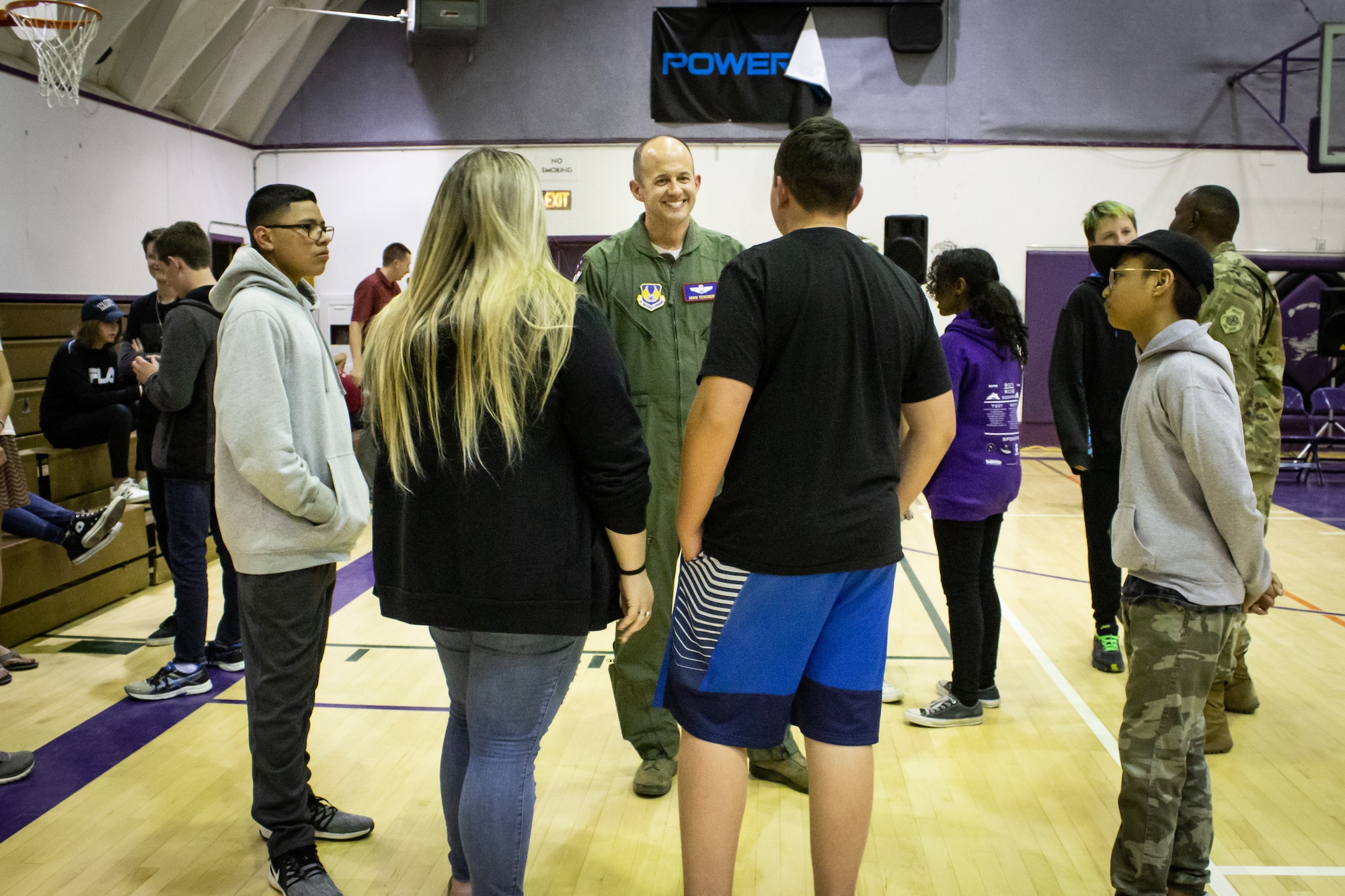 Brig. Gen. E. John Teichert, 412th Test Wing commander, talks with Desert High School students at Edwards Air Force Base, Calif., April 18. Teichert commemorated the Month of the Military Child by thanking the students themselves. (U.S. Air Force photo by Jade Black)