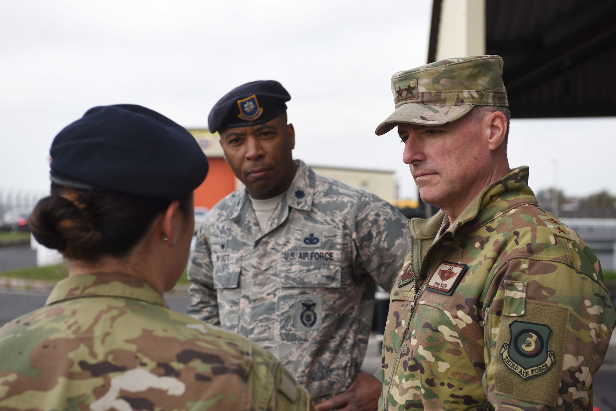 U.S. Air Force Maj. Gen. John Wood, Third Air Force commander, listens to U.S. Air Force Staff Sgt. Katherine Tedrow discuss 100th Security Forces Squadron infrastructure developments at RAF Mildenhall, England, April 3, 2019. Third AF leadership toured the 100th Logistics Readiness Squadron hangar, the 100th Communications Squadron control facility and the 100th Maintenance Squadron aircraft ground equipment shop. (U.S. Air Force photo by Airman 1st Class Brandon Esau)