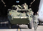 A Stryker from “Attack” Company, 3rd Battalion, 161st Infantry Regiment is being loaded in to a C-17 operated by the 62nd Airlift Wing at Grays Army Airfield, Joint Base Lewis-McChord, on April 4, 2019. The equipment load up was part of a week-long training exercise for the battalion that starts at unit home stations, flying to Moses Lake Airport, then convoying to Yakima Training Center.
