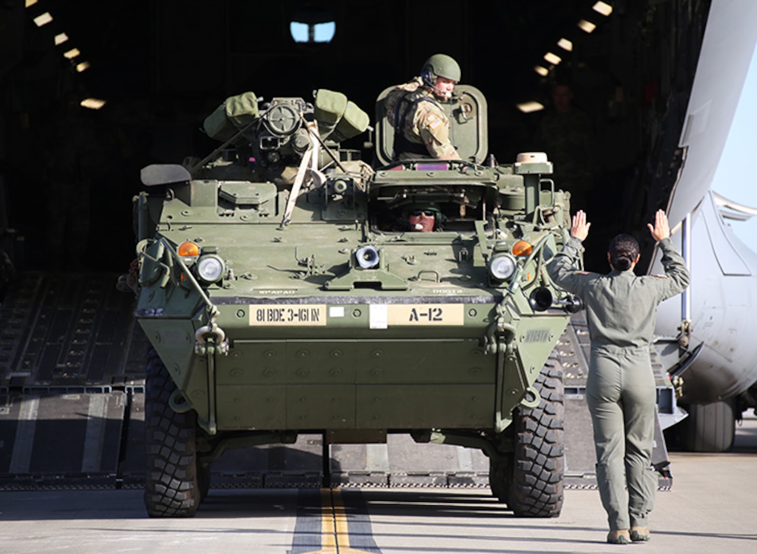 A Stryker from “Attack” Company, 3rd Battalion, 161st Infantry Regiment is being loaded in to a C-17 operated by the 62nd Airlift Wing at Grays Army Airfield, Joint Base Lewis-McChord, on April 4, 2019. The equipment load up was part of a week-long training exercise for the battalion that starts at unit home stations, flying to Moses Lake Airport, then convoying to Yakima Training Center.