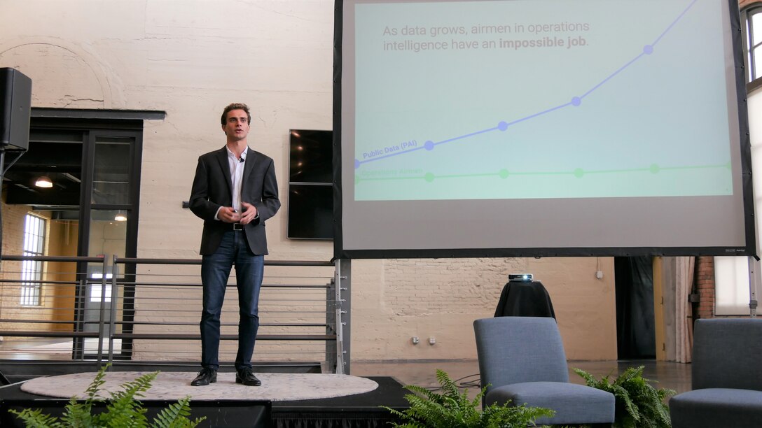 Alex Sands from Plasticity, pitches the technique of filtering publically available information (PAI) to help ISR analysts rapidly identify threats. (U.S. Air Force photo/Emily Martin)