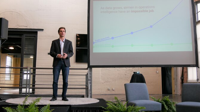 Alex Sands from Plasticity, pitches the technique of filtering publically available information (PAI) to help ISR analysts rapidly identify threats. (U.S. Air Force photo/Emily Martin)