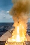 The guided missile destroyer USS Thomas Hudner (DDG 116) fires an SM-2 missile during a live-fire missile exercise off the 
coast of Virginia, March 25, 2019. The AEGIS Virtual Twin controlled the missile to successfully intercept an inbound target.