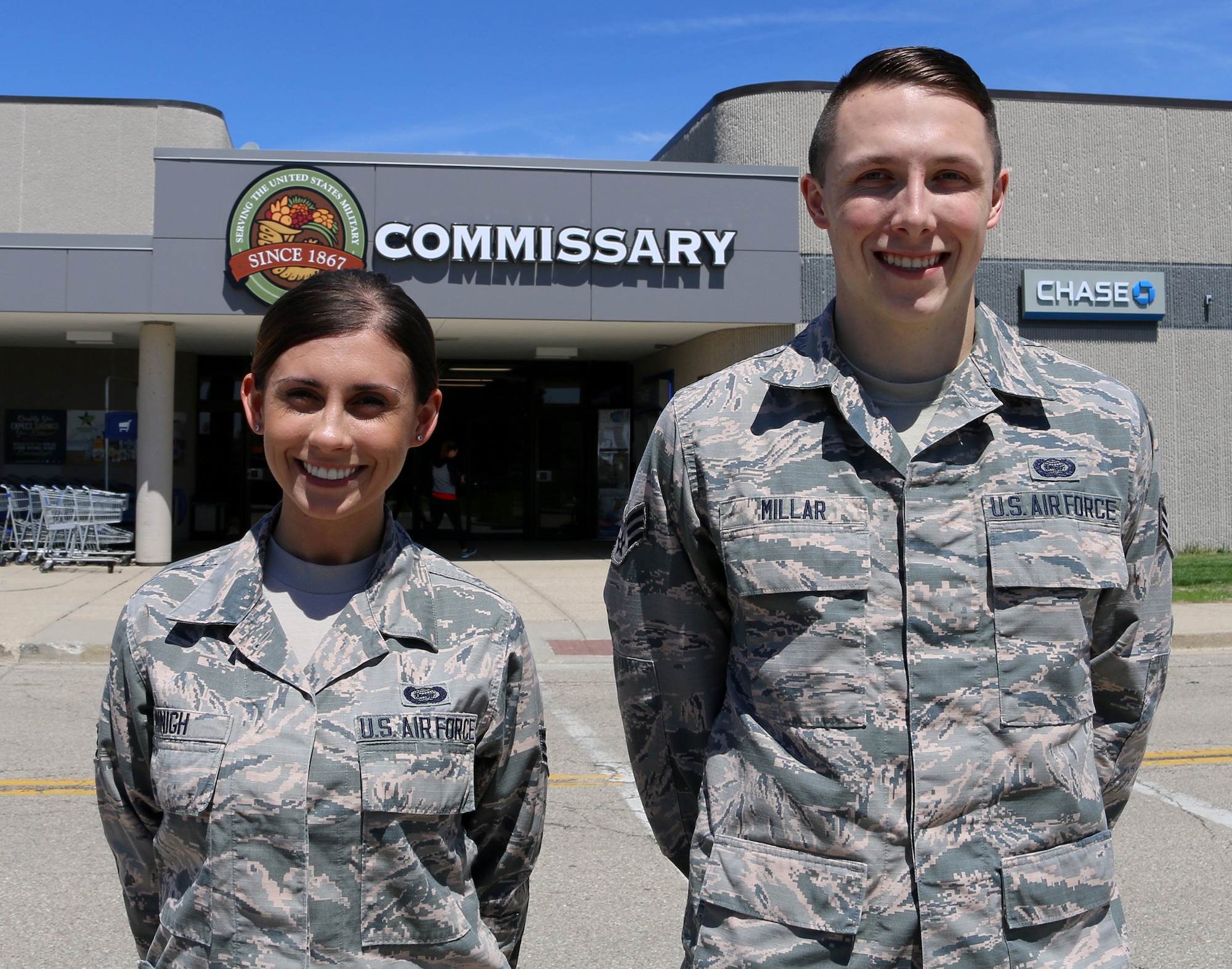 Senior Airmen Kassandra Minigh and Collin Millar, 14th Intelligence Squadron all-source analysts, provided aid to a customer having a seizure at the Wright-Patterson Air Force Base commissary March 27, 2019. Their efforts helped save the woman’s life.