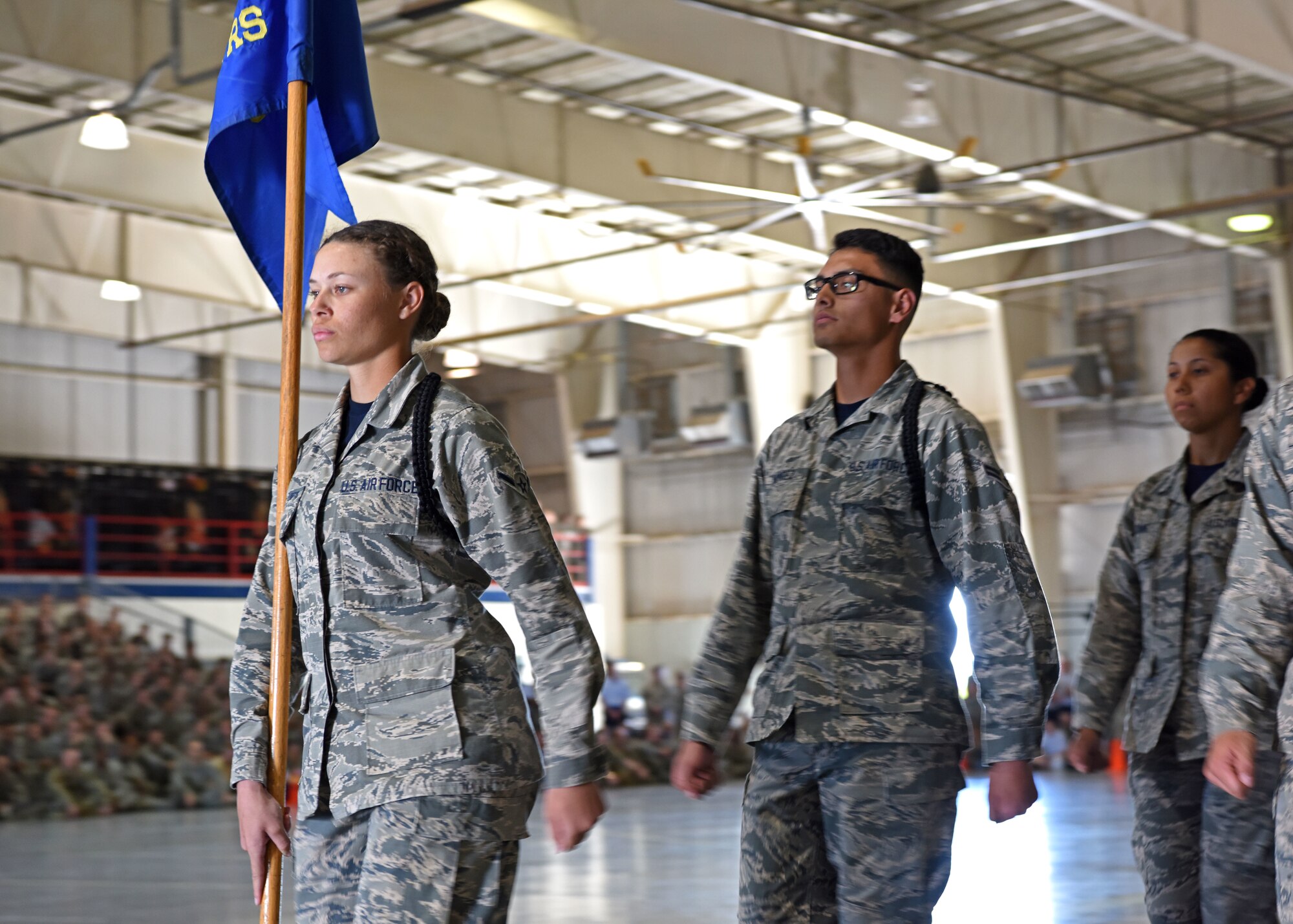 Black ropes from the 315th Training Squadron march during the regulation drill at the Louis F. Garland Department of Defense Fire Academy on Goodfellow Air Force Base, Texas, April 19, 2019. The teams were judged based on their marching skills and drill movements. (U.S. Air Force photo by Airman 1st Class Ethan Sherwood/Released)