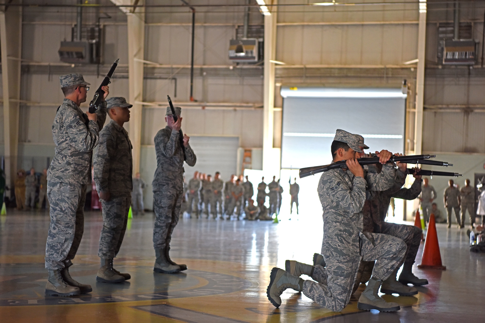 The 312th Training Squadron drill team perform their rifle routine during the drill competition at the Louis F. Garland Department of Defense Fire Academy on Goodfellow Air Force Base, Texas, April 19, 2019. The exhibition drill portion allowed teams to compete against each other using their own routines. (U.S. Air Force photo by Airman 1st Class Ethan Sherwood/Released)