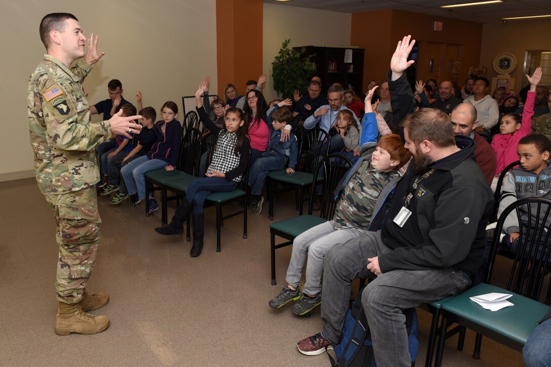 Lt. Col. Cullen Jones, U.S. Army Corps of Engineers Nashville District commander, welcomes employees and their family members to the Nashville District Headquarters at the Estes Kefauver Federal Building in Nashville, Tenn., during Bring Your Family to Work Day April 19, 2019. (USACE photo by Lee Roberts)