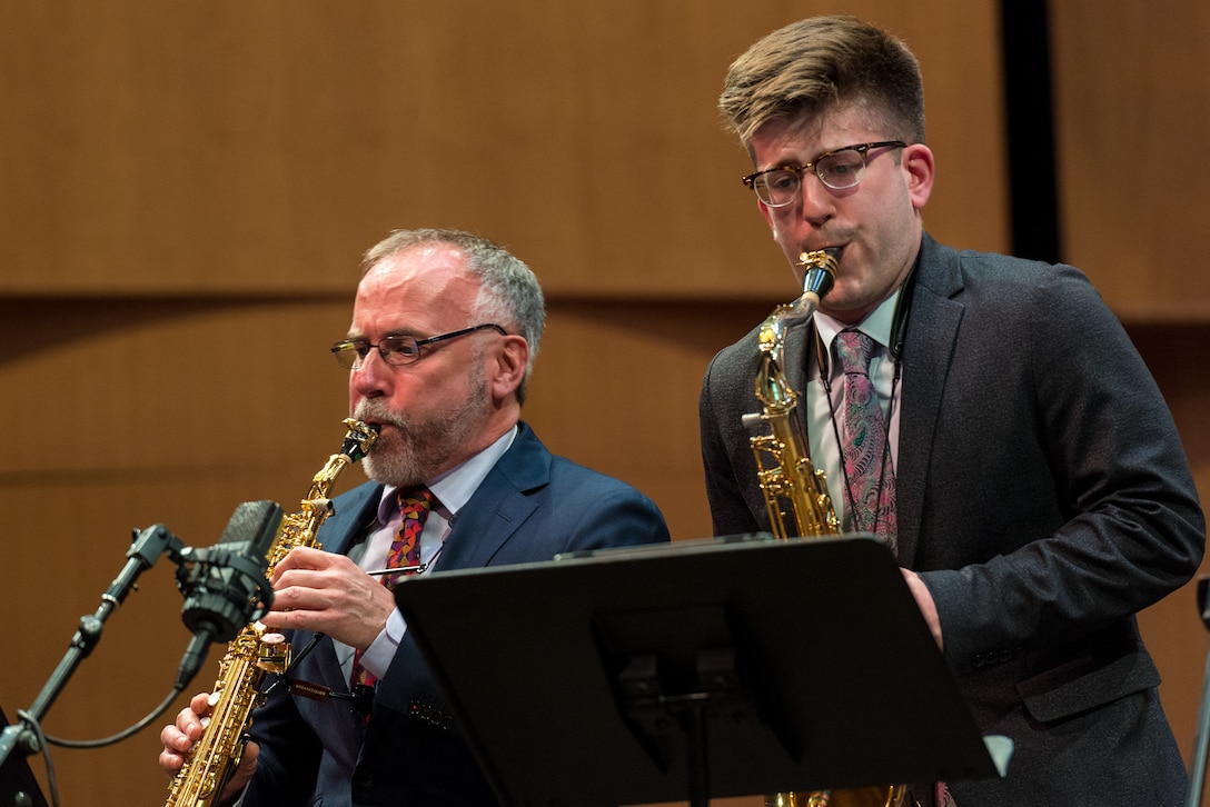 Internationally acclaimed saxophonist Joe Lulloff plays alongside his son, Jordan Lulloff, as they perform with the U.S. Air Force Concert Band on Thursday, Apr. 18, at the Rachel M. Schlesinger Concert Hall and Arts Center in Alexandria, Virginia. This concert was the final installment of The U.S. Air Force Band's 2019 Guest Artist Series. (U.S. Air Force photo by Master Sgt. Grant Langford)