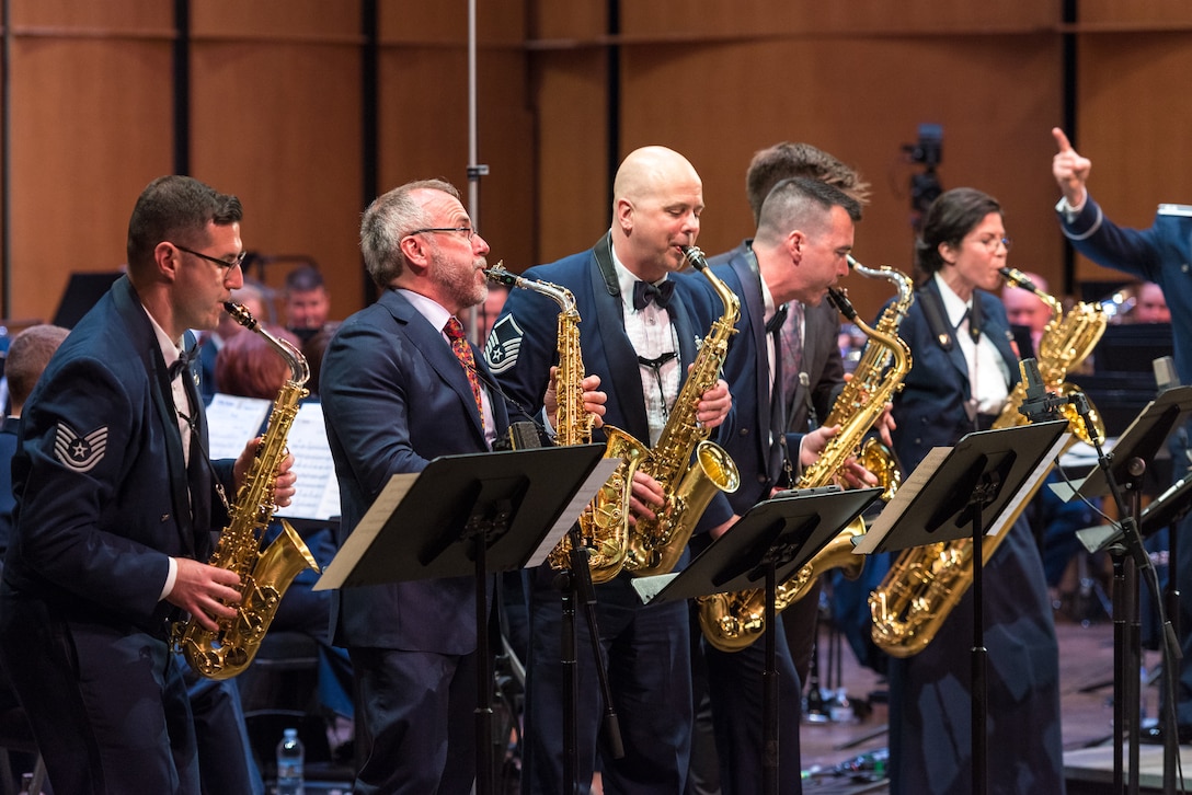 Internationally acclaimed saxophonist Joe Lulloff and his son, Jordan Lulloff, join the saxophone section of the U.S. Air Force Concert Band on Thursday, Apr. 18, at the Rachel M. Schlesinger Concert Hall and Arts Center in Alexandria, Virginia. This concert was the final installment of The U.S. Air Force Band's 2019 Guest Artist Series. (U.S. Air Force photo by Master Sgt. Grant Langford)