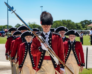 The U.S. Army Old Guard Fife and Drum Corps perform April 20, 2019, at Joint Base San Antonio-Fort Sam Houston, Texas during the Fiesta and Fireworks Extravaganza. Fiesta honors the long-standing partnership between the U.S. military and San Antonio in annual Fiesta events, which commemorate Texas’ independence after the Battle of San Jacinto and the Alamo.  (U.S. Air Force photo by Senior Airman Stormy Archer)