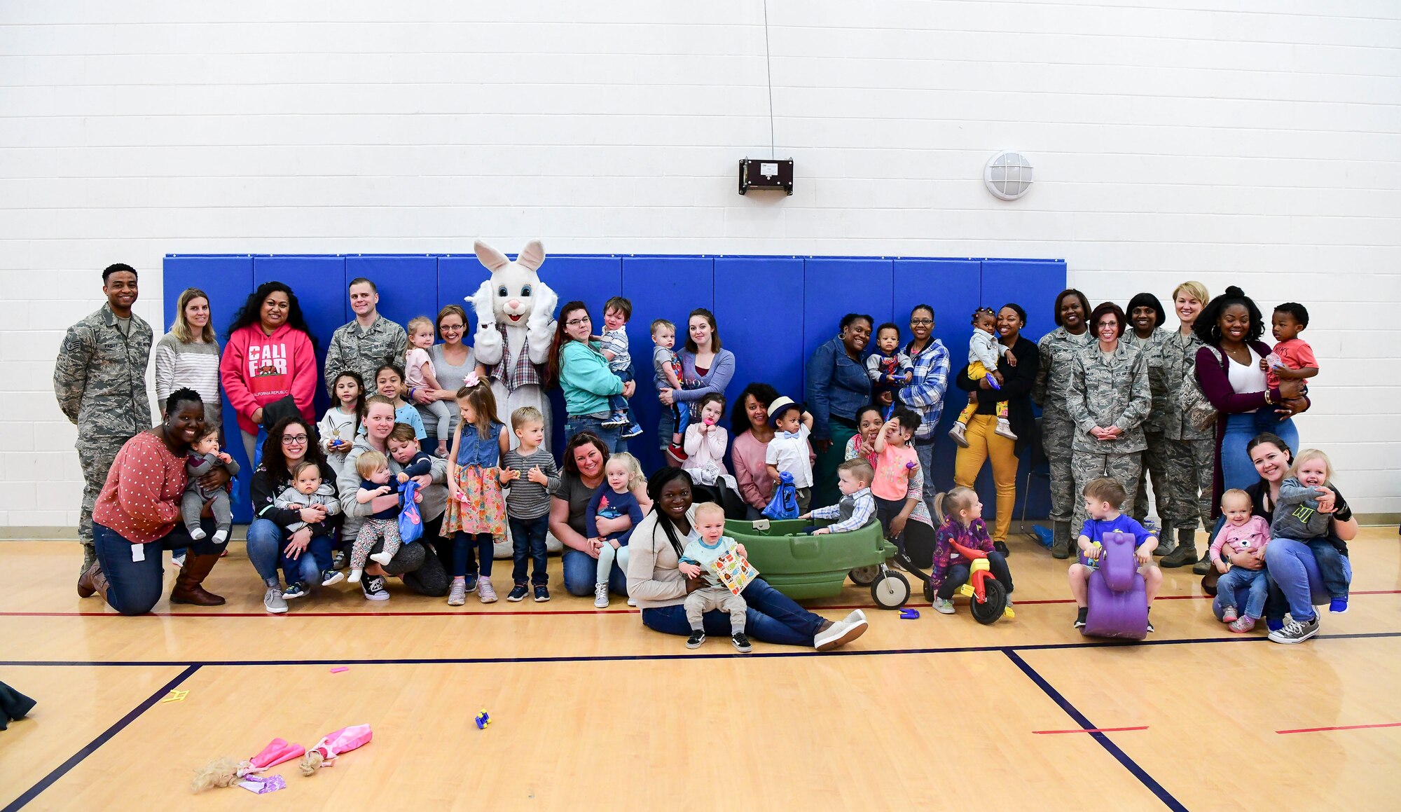 Participants of the Family Advocacy Program’s Play Group Easter Egg Hunt held in recognition of National Child Abuse Prevention Month gather on April 17, 2019, at Dover Air Force Base, Del. Over 40 people participated, including the Easter Bunny. (U.S. Air Force photo by Senior Airman Christopher Quail)