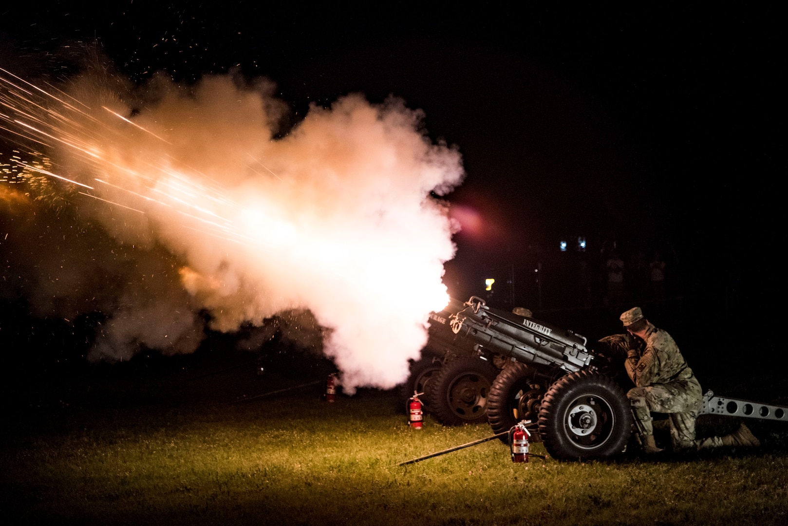 Soldiers fire an artillery barrage April 20, 2019, at Joint Base San Antonio-Fort Sam Houston, Texas during the Fiesta and Fireworks Extravaganza. Fiesta honors the long-standing partnership between the U.S. military and San Antonio in annual Fiesta events, which commemorate Texas’ independence after the Battle of San Jacinto and the Alamo.  (U.S. Air Force photo by Senior Airman Stormy Archer)